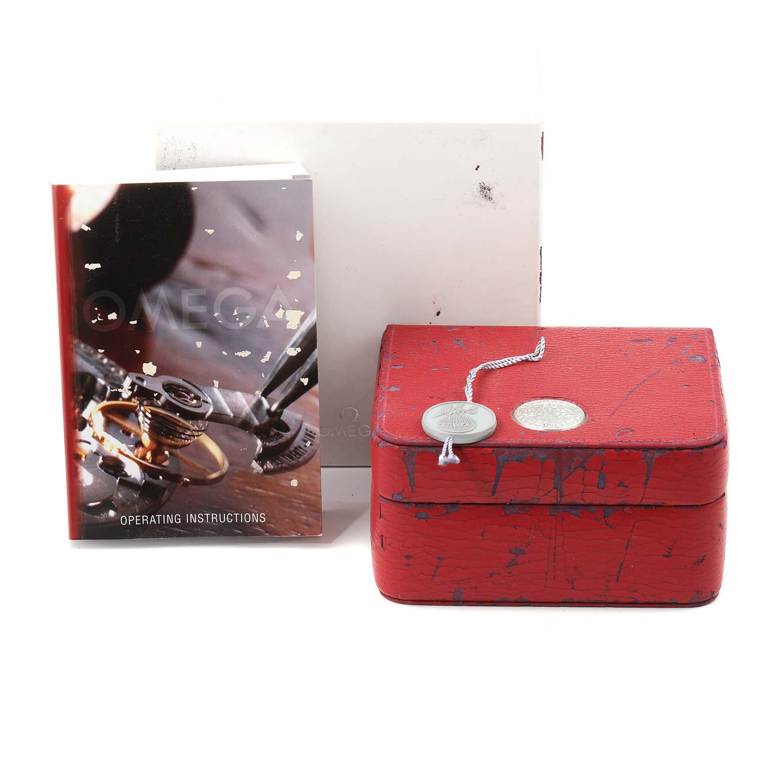 The image shows the operating instructions, a red box, and packaging for the Omega Aqua Terra 2503.33.00 Men
s Stainless Steel Silver Dial 2503.33.00 Men
s Stainless Steel Silver Dial watch model.