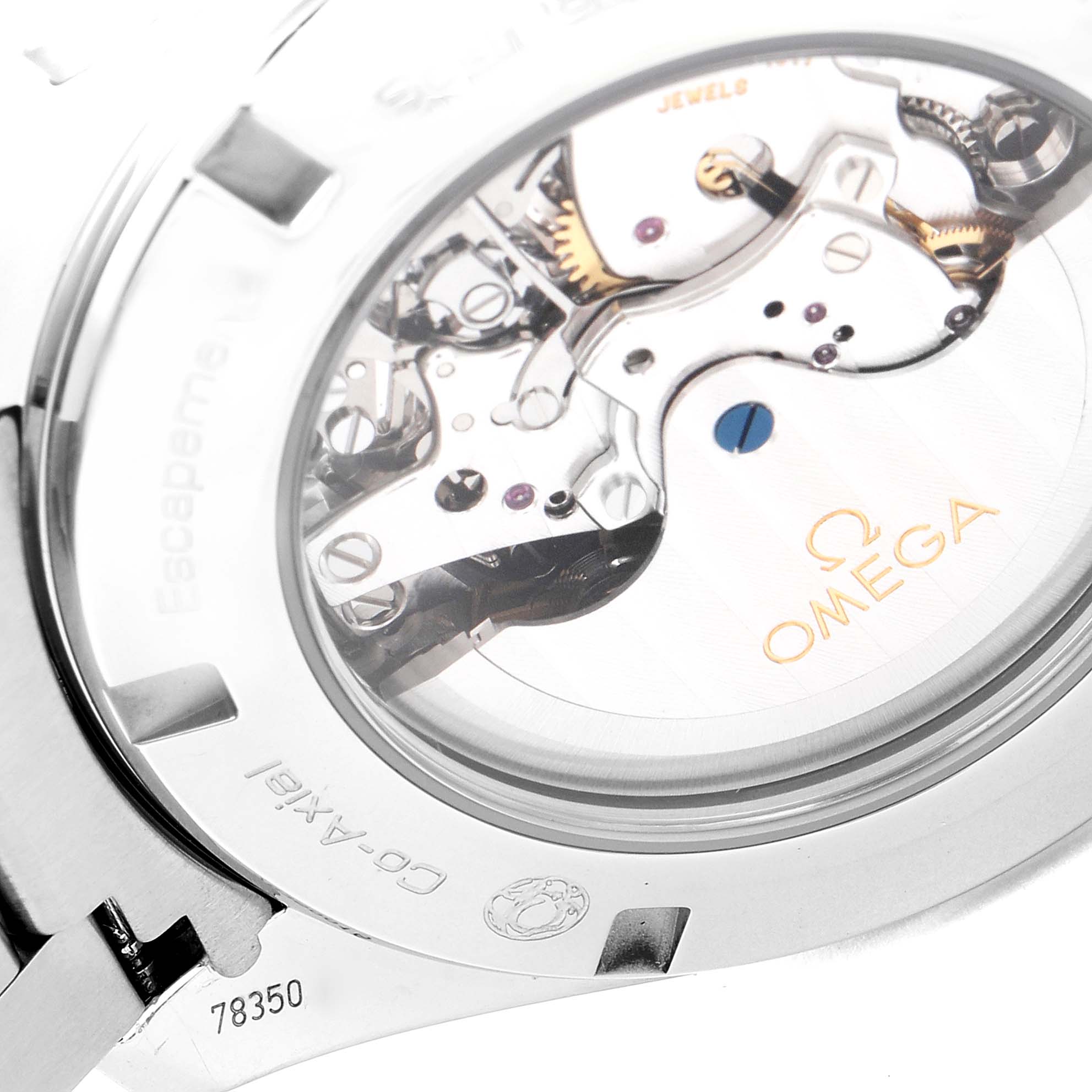 The image shows the back view of the Omega Aqua Terra 231.10.44.50.04.001 Men's Stainless Steel White Dial 231.10.44.50.04.001 Men's Stainless Steel White Dial watch, highlighting its exposed movement and internal mechanisms.