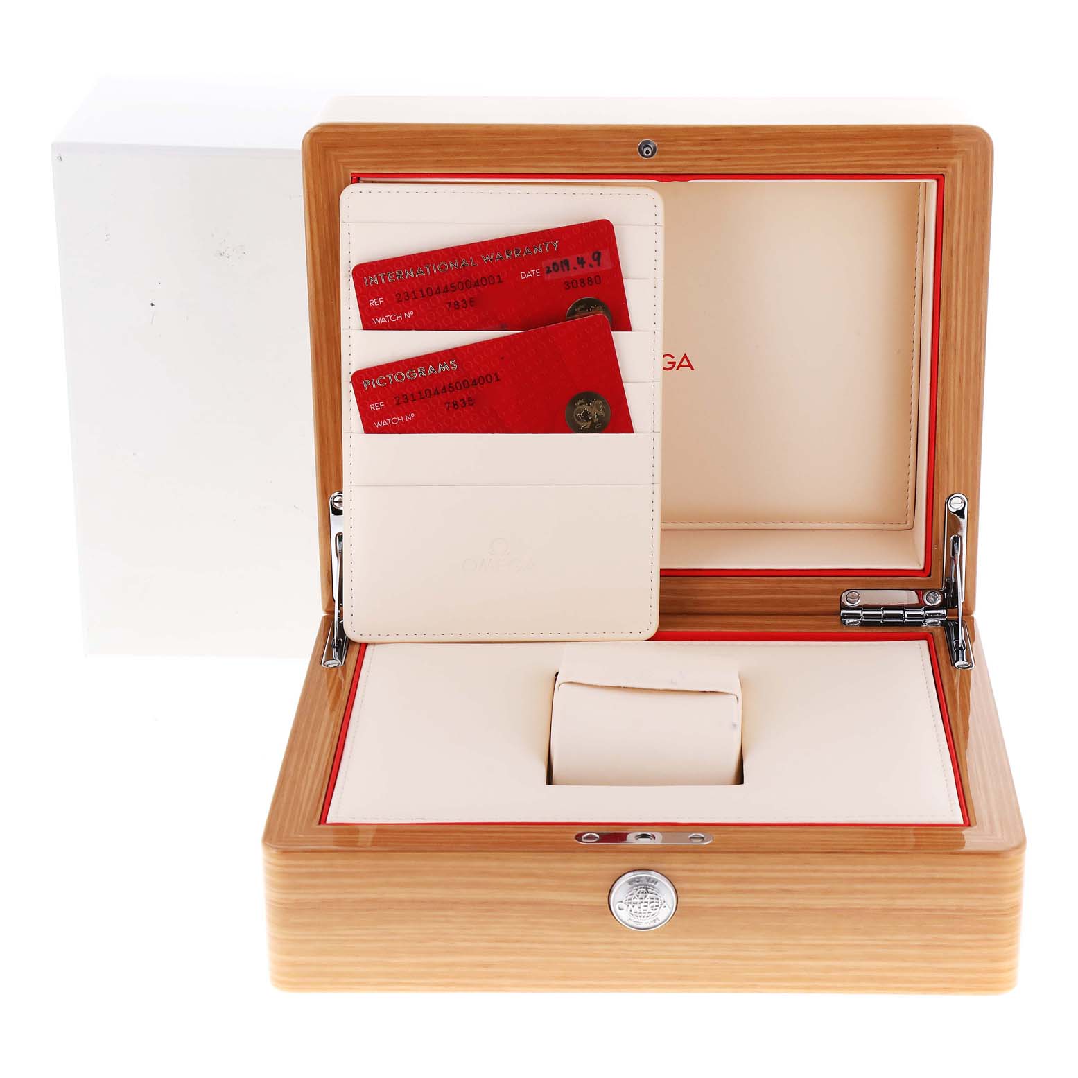 This image shows the inside of an Omega Aqua Terra 231.10.44.50.04.001 Men's Stainless Steel White Dial 231.10.44.50.04.001 Men's Stainless Steel White Dial watch box, including warranty cards and a slot for the watch.