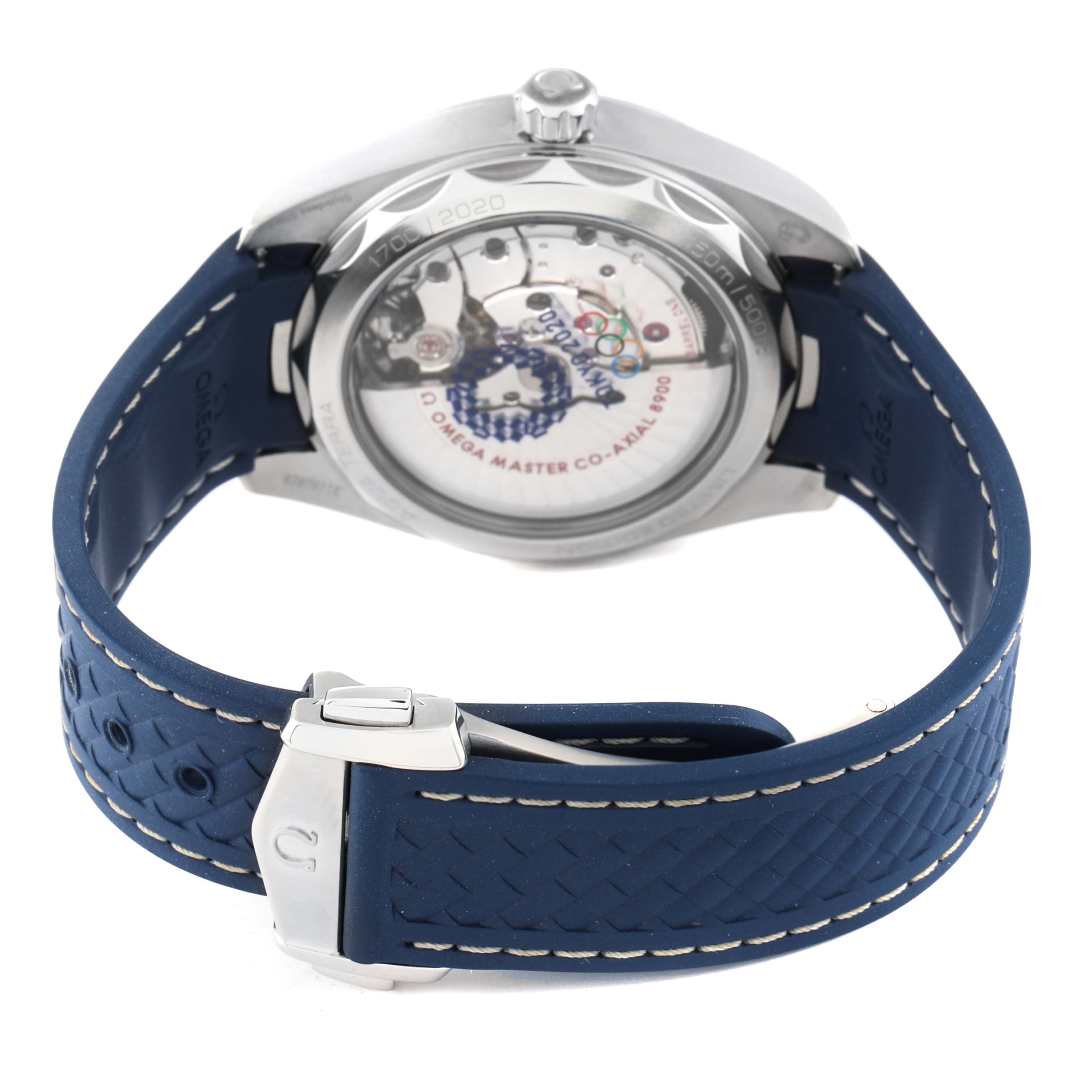 The image shows the back view of an Omega Aqua Terra 522.12.41.21.03.001 Men's Stainless Steel Blue Dial 522.12.41.21.03.001 Men's Stainless Steel Blue Dial watch, highlighting its movement and blue strap with a silver clasp.