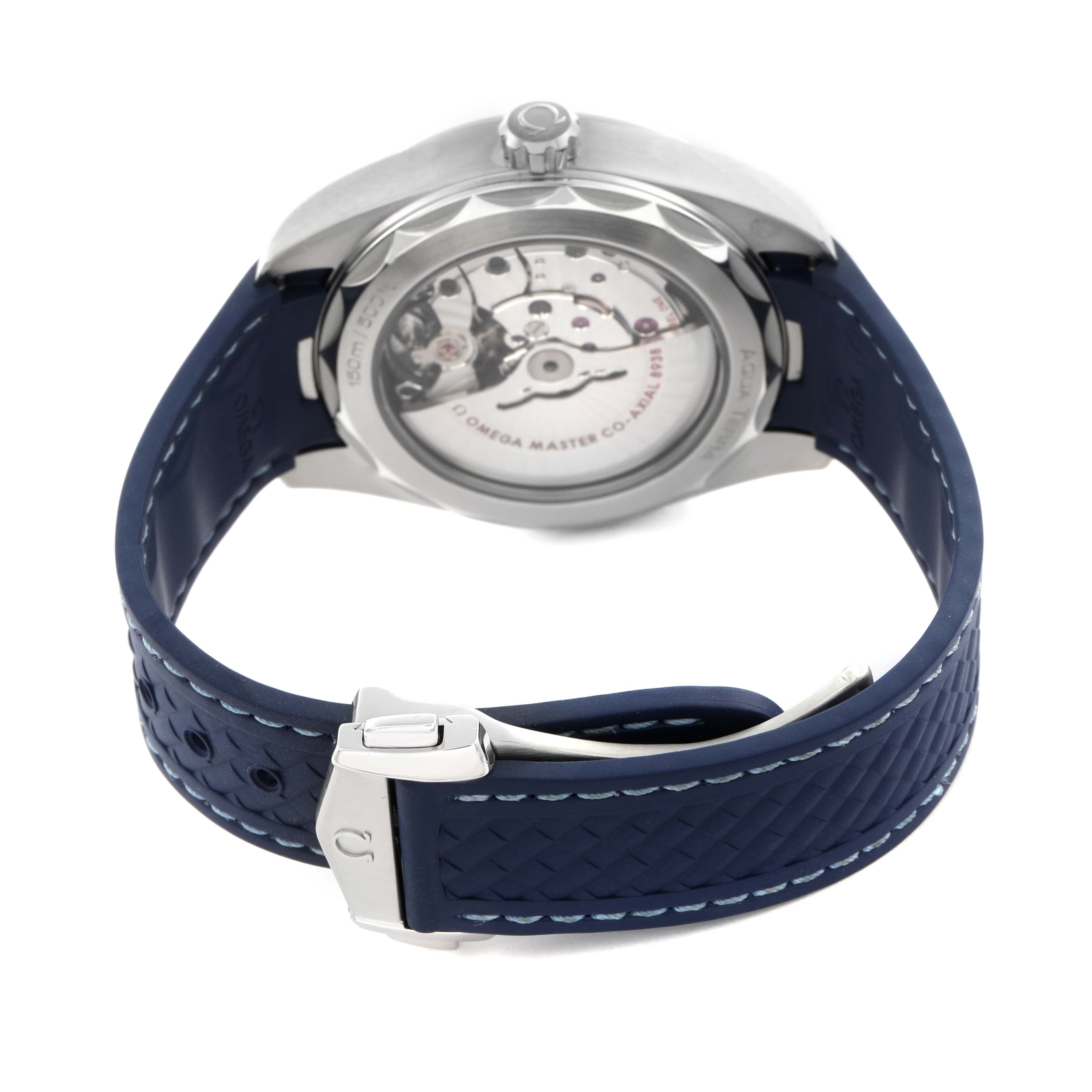 The image shows the Omega Aqua Terra 220.12.43.22.03.001 Men
s Stainless Steel Blue Dial 220.12.43.22.03.001 Men
s Stainless Steel Blue Dial
s back, featuring the movement through a sapphire caseback and a blue textured strap.