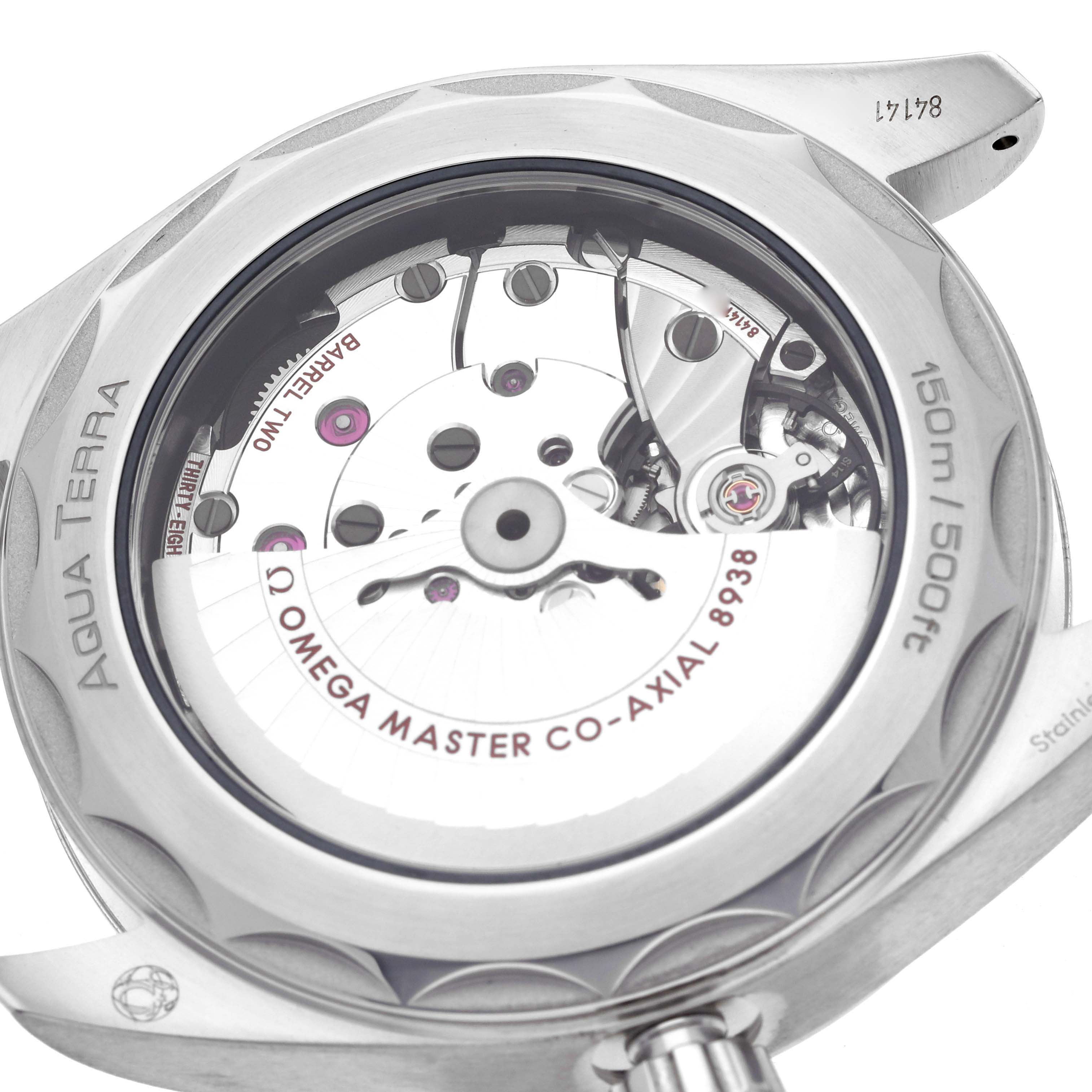 The Omega Aqua Terra 220.12.43.22.03.001 Men
s Stainless Steel Blue Dial 220.12.43.22.03.001 Men
s Stainless Steel Blue Dial watch is shown from the back, displaying the movement and engravings.