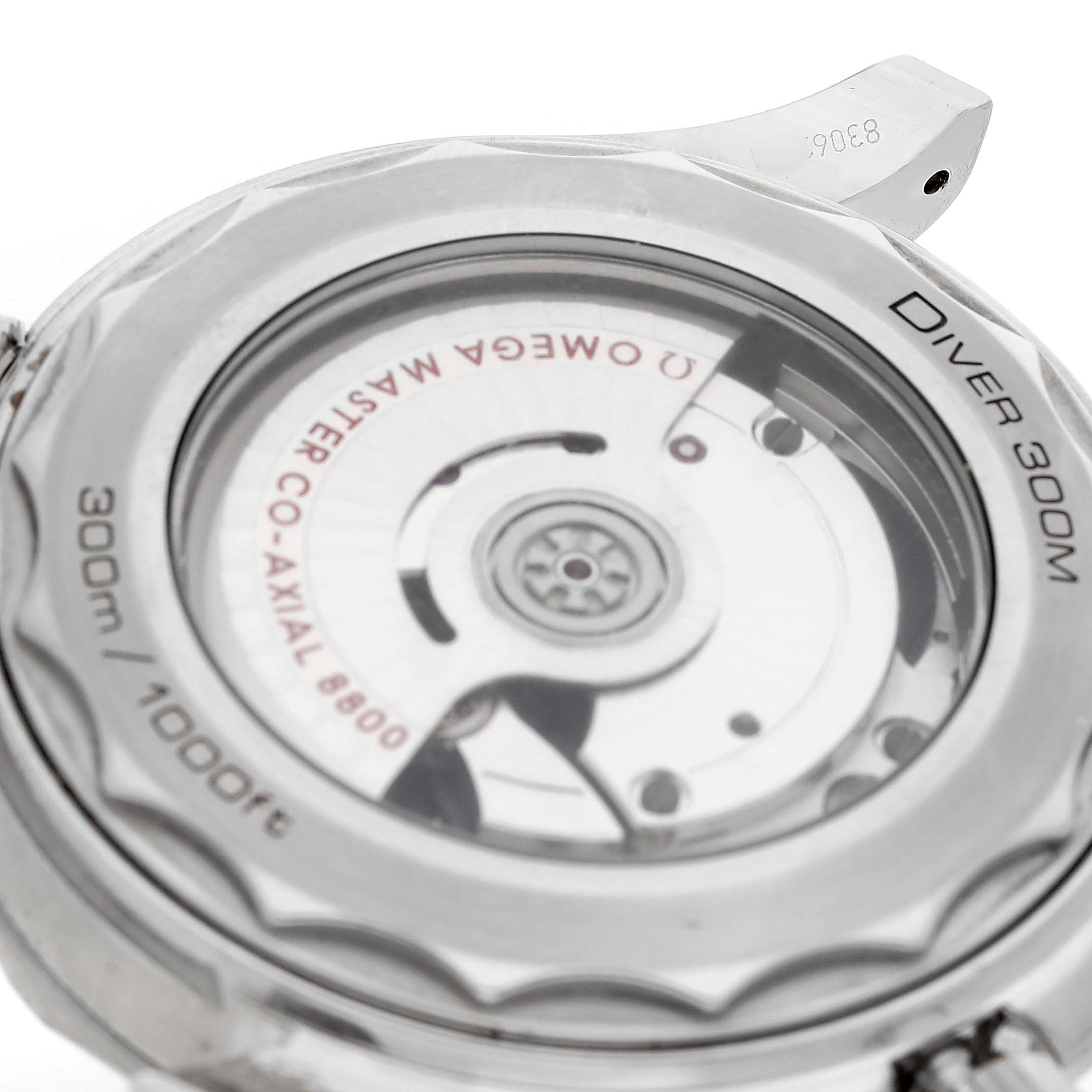 The image shows the back of an Omega Seamaster 210.32.42.20.06.001 Men's Stainless Steel Grey Dial, focusing on its transparent case back and Co-Axial movement.