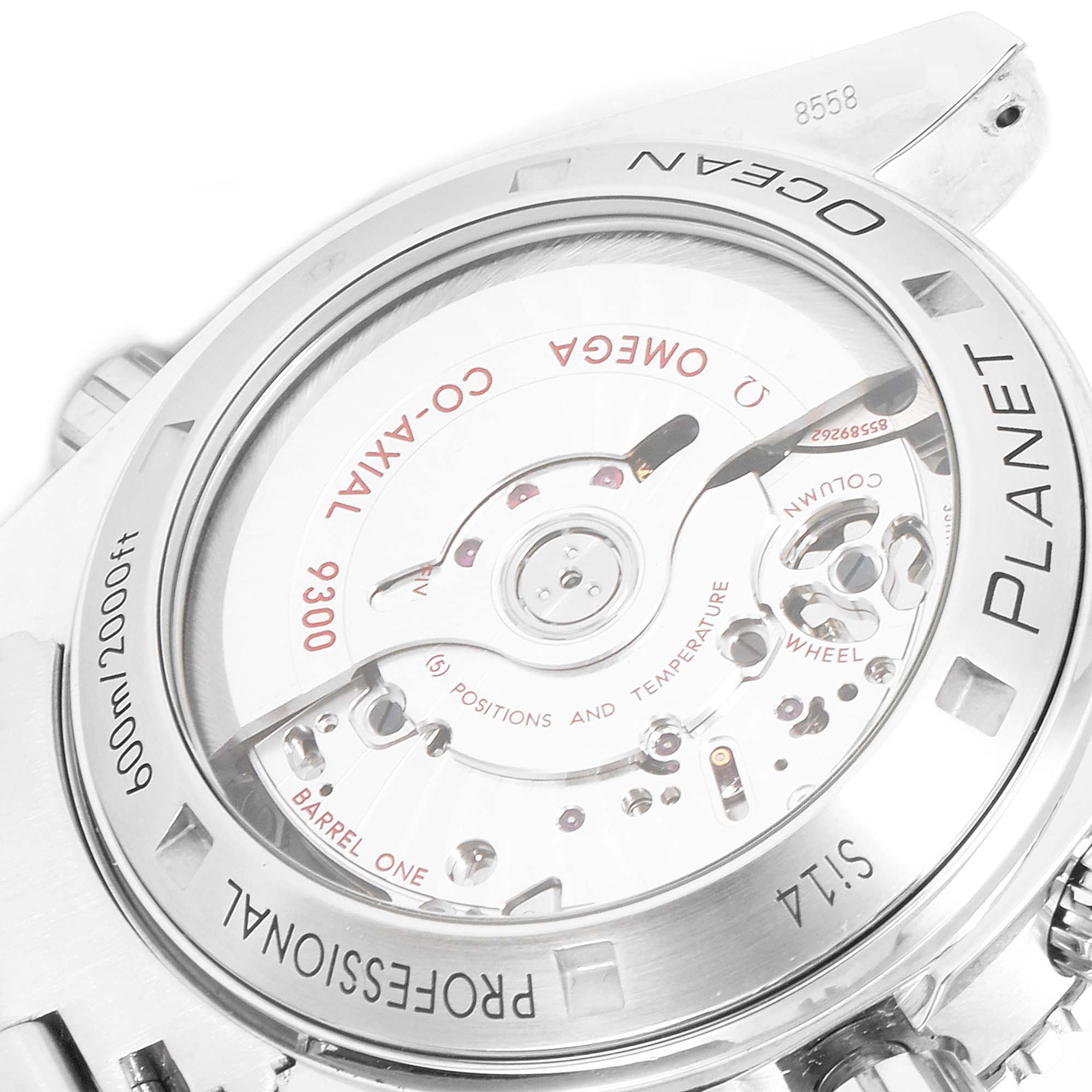 The image shows the back view of the Omega Planet Ocean 232.30.42.21.01.001 Men
s Stainless Steel Black Dial 232.30.42.21.01.001 Men
s Stainless Steel Black Dial watch, highlighting the watch
s internal Co-Axial 9300 movement.