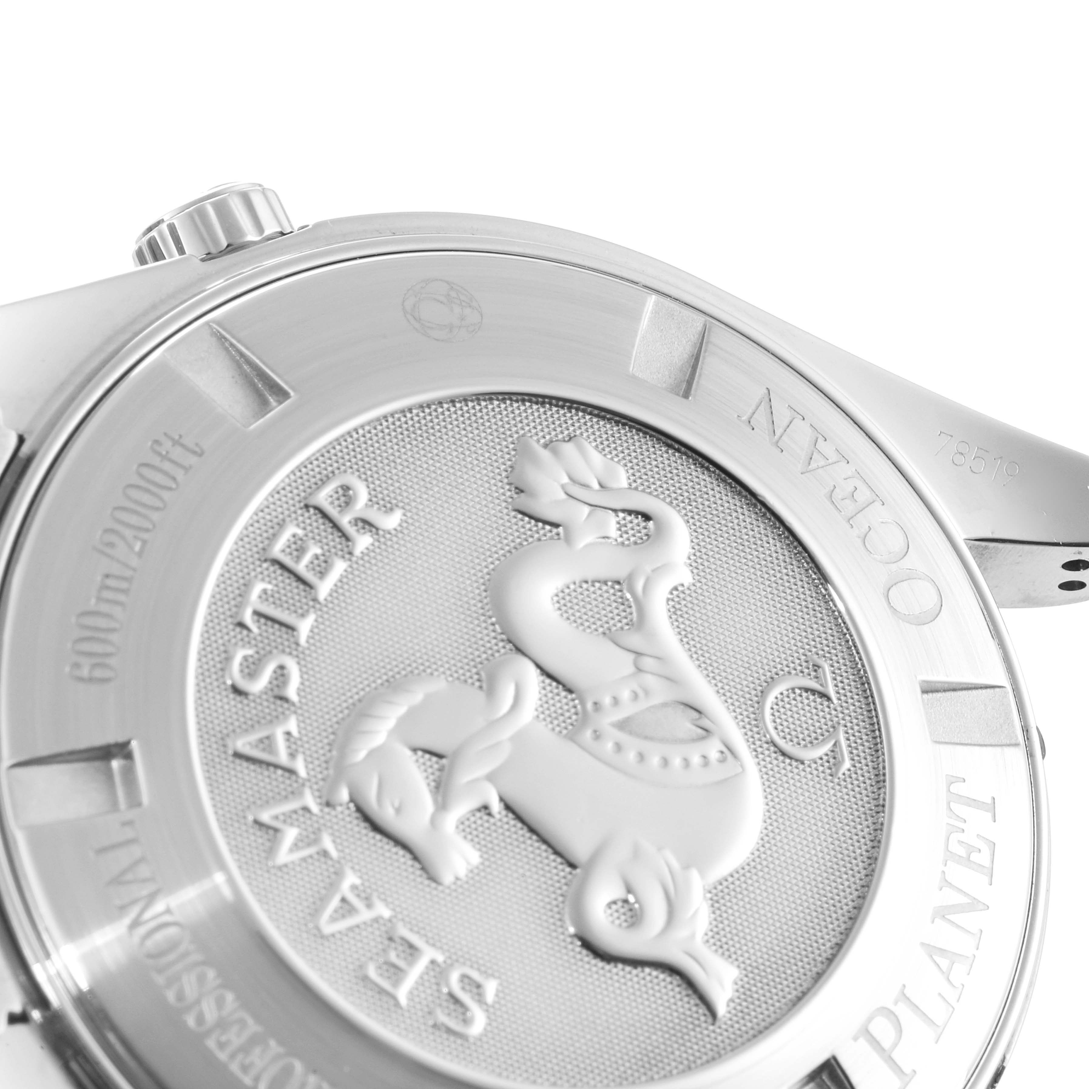 This image shows the back case of an Omega Planet Ocean 2210.50.00 Men
s Stainless Steel Black Dial 2210.50.00 Men
s Stainless Steel Black Dial watch, highlighting the "Seamaster" engraving and emblem.