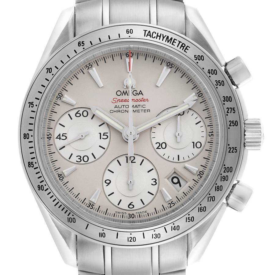 The Omega Speedmaster watch is shown from a front angle, displaying its dial, subdials, tachymeter bezel, and part of the bracelet.