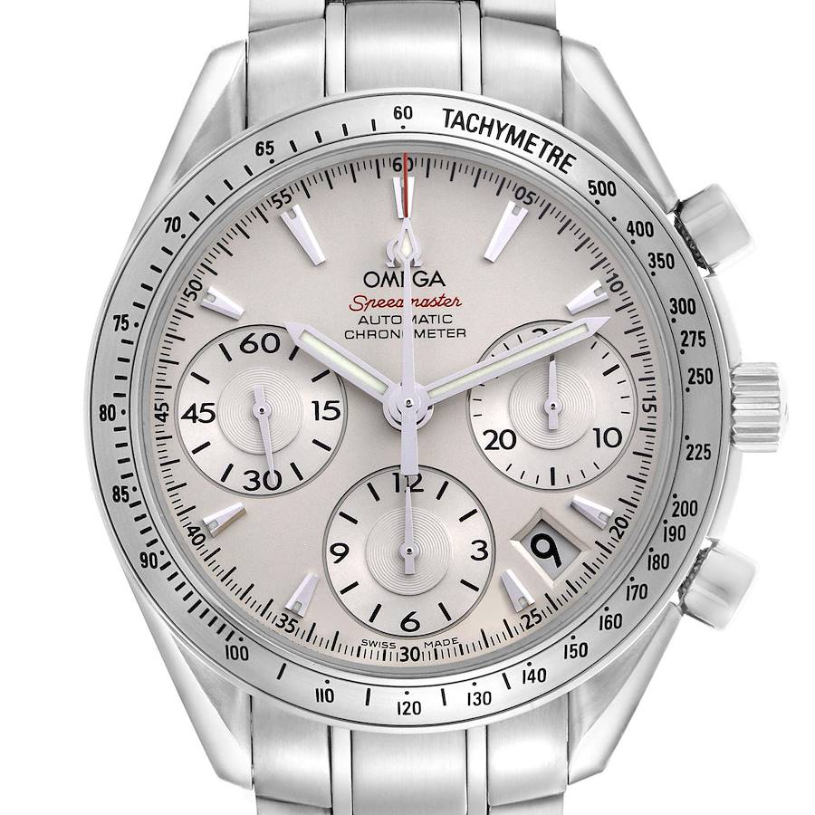 The Omega Speedmaster watch is shown from the front, displaying the face, subdials, tachymeter bezel, and part of the bracelet.