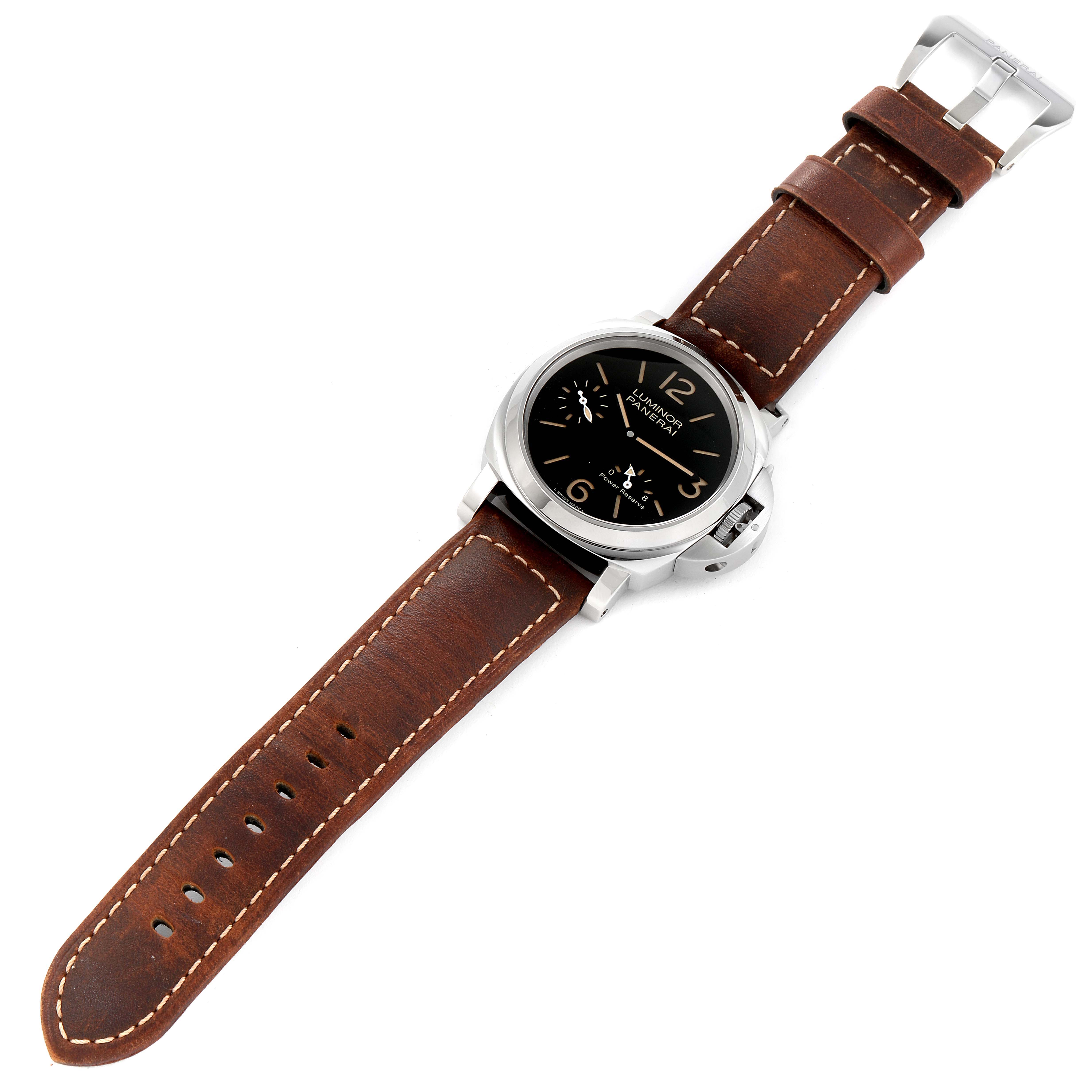 The image shows a Panerai Luminor PAM00795 Men
s Stainless Steel Black Dial PAM00795 Men
s Stainless Steel Black Dial model watch from a top-down angle, featuring a brown leather strap and black dial.