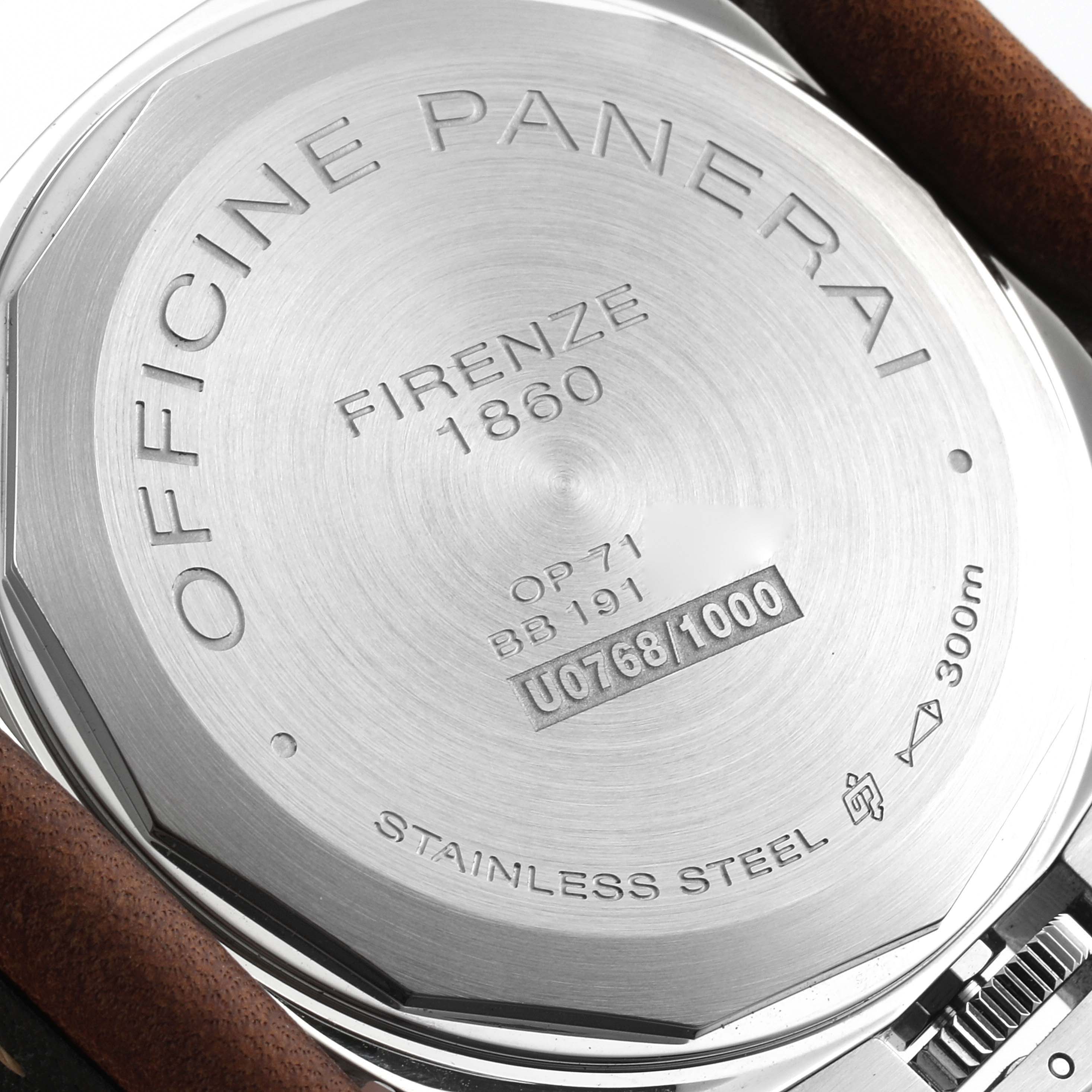 The image shows the case back of the Panerai Luminor PAM00795 Men
s Stainless Steel Black Dial PAM00795 Men
s Stainless Steel Black Dial watch, highlighting its engravings and details.