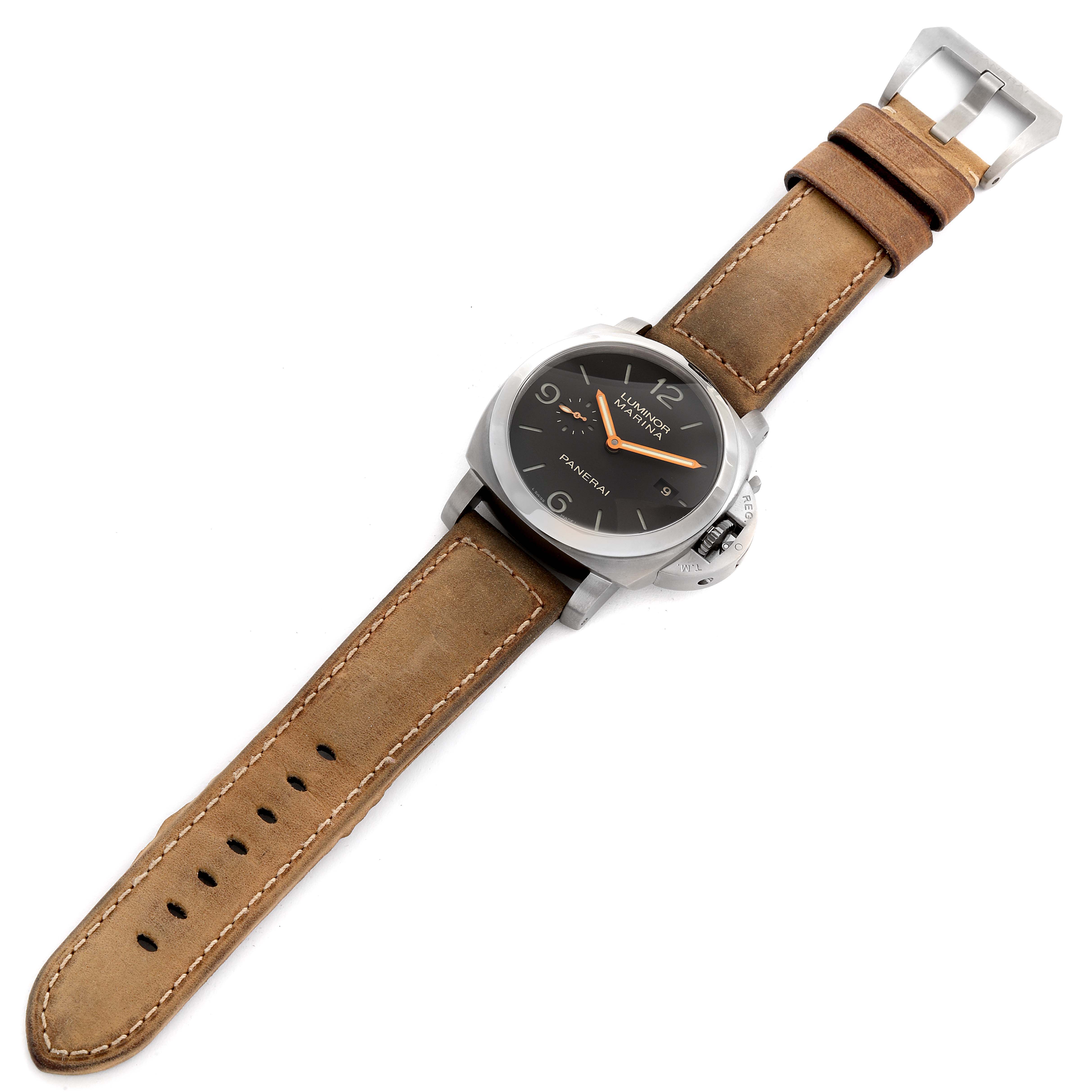 The Panerai Luminor PAM00351 Men's Titanium Black Dial PAM00351 Men's Titanium Black Dial watch is shown from a top-down angle, displaying its face, crown guard, and leather strap.