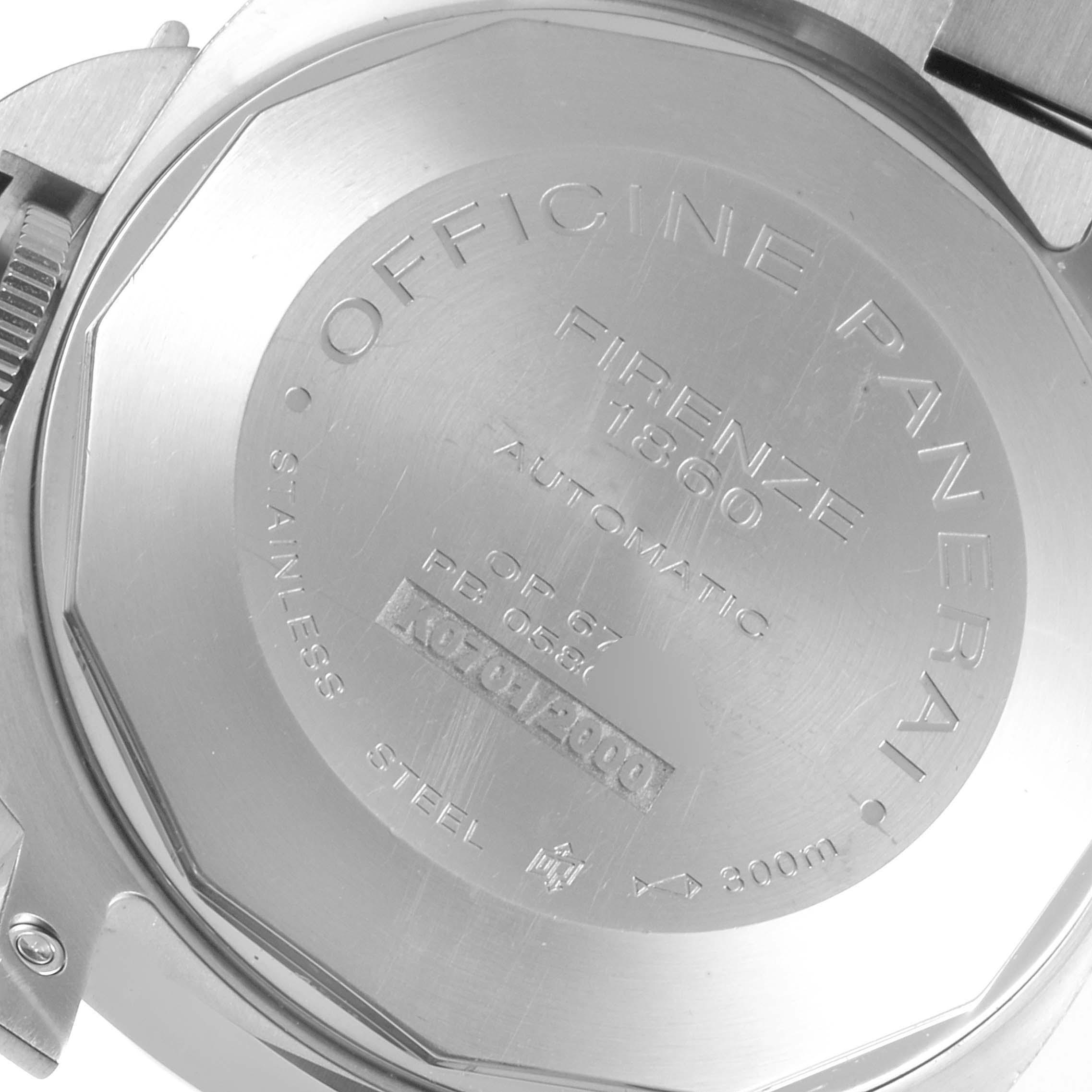 This is a close-up shot of the back case of a Panerai Luminor PAM00299 Men
s Stainless Steel Black Dial PAM00299 Men
s Stainless Steel Black Dial watch, showing engravings and model details.