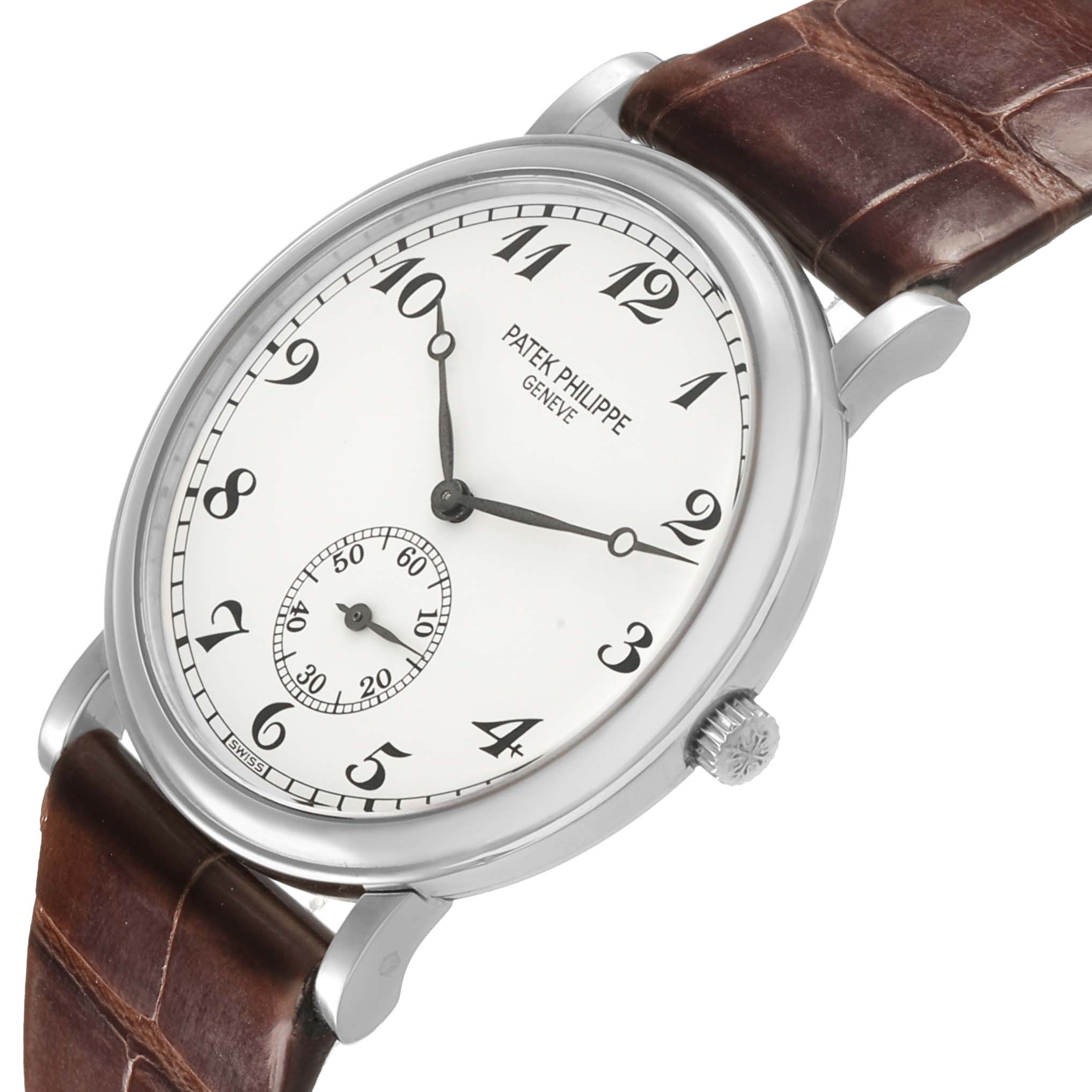 The Patek Philippe Calatrava 5022P-012 Men's Platinum White Dial watch is shown at a slight angle, displaying the dial, hands, crown, and brown leather strap.