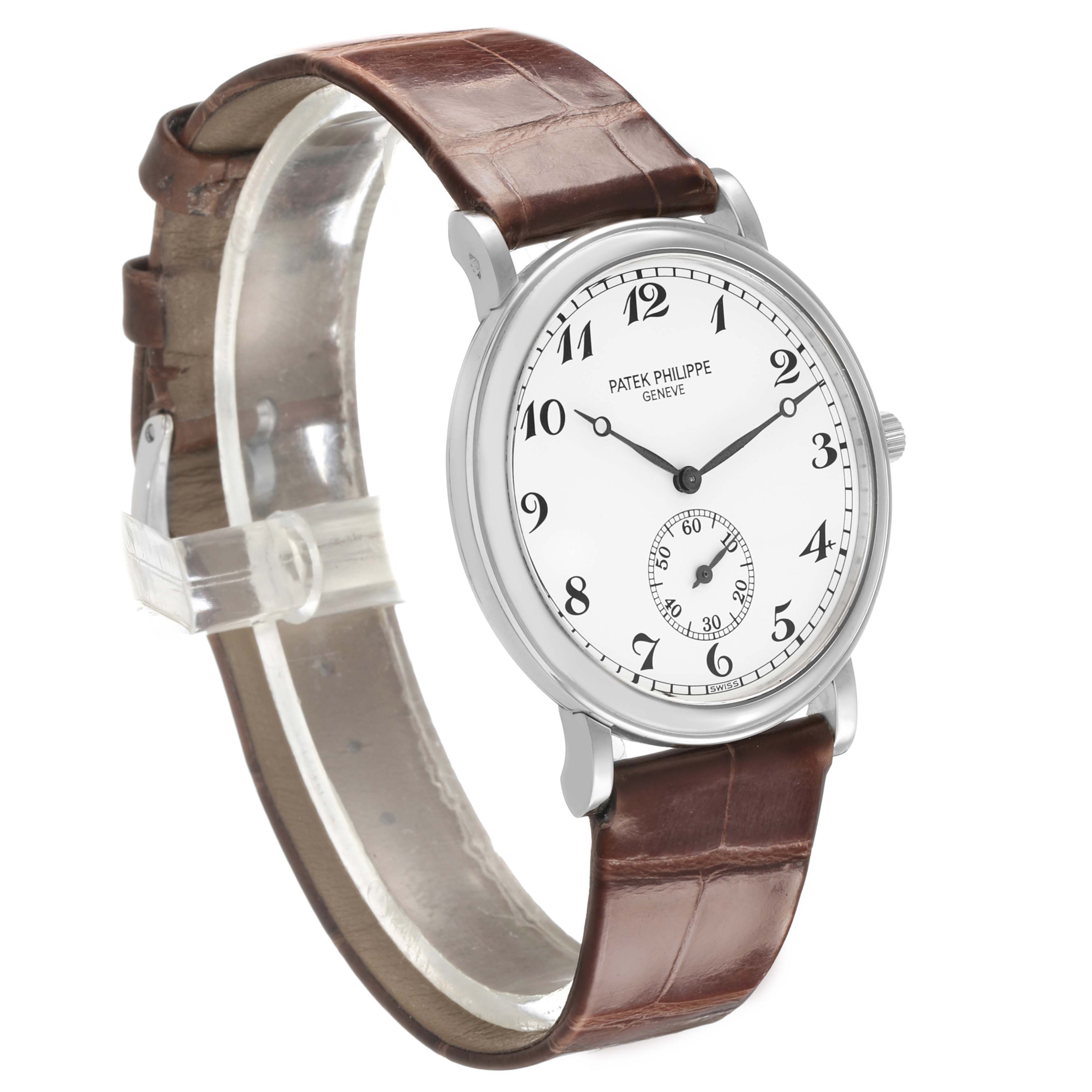 The image shows a Patek Philippe Calatrava 5022P-012 Men's Platinum White Dial watch at a three-quarter angle, displaying its face, case, crown, and leather strap.