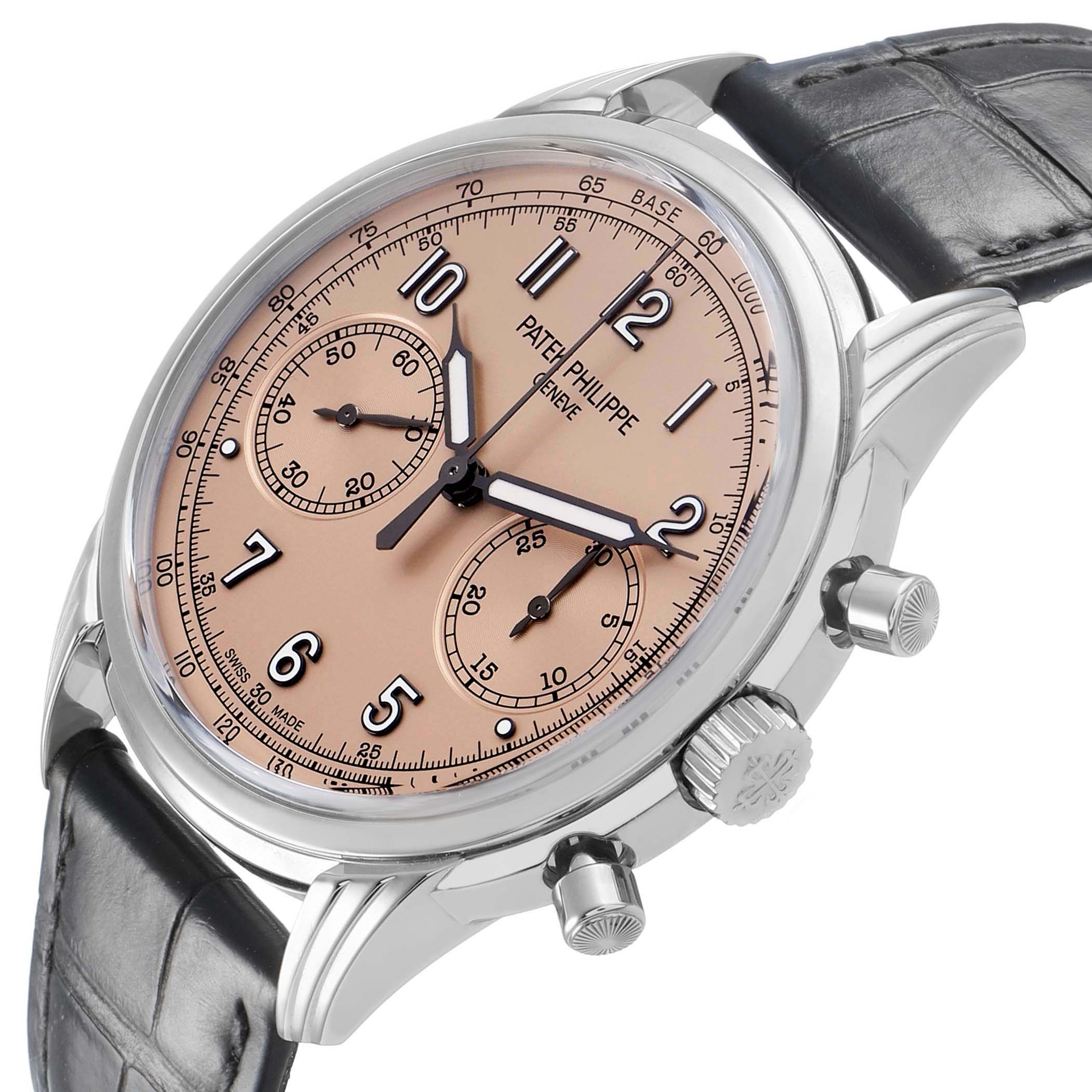 The Patek Philippe Complications 5172G-001 Men's White Gold Orange Dial watch is shown from a three-quarter angle, highlighting the face, crown, and pushers.