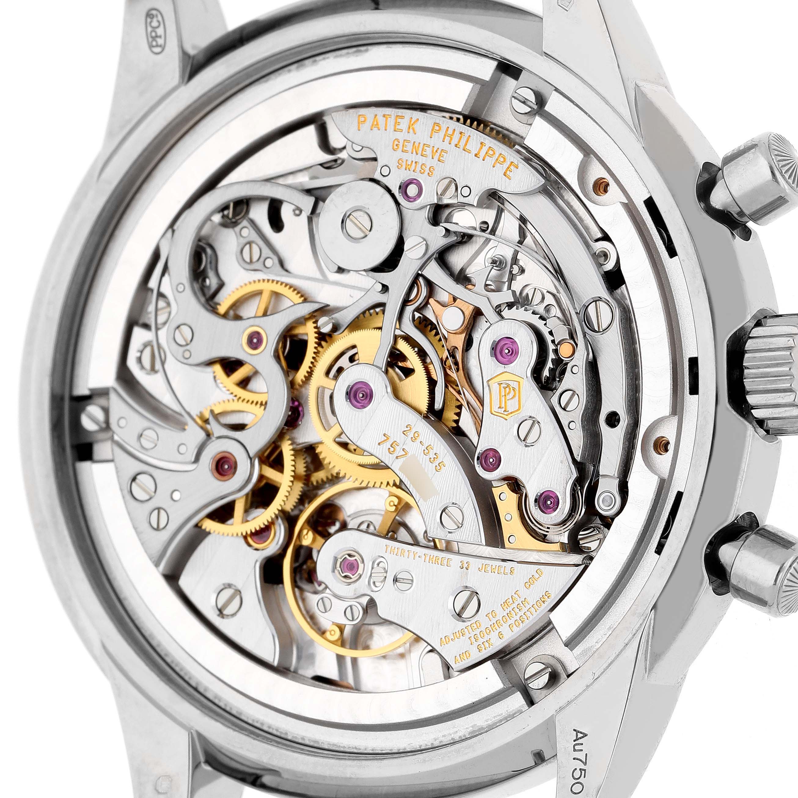 The image shows the back of a Patek Philippe Complications 5172G-001 Men's White Gold Orange Dial watch, highlighting its intricate mechanical movement and gears.