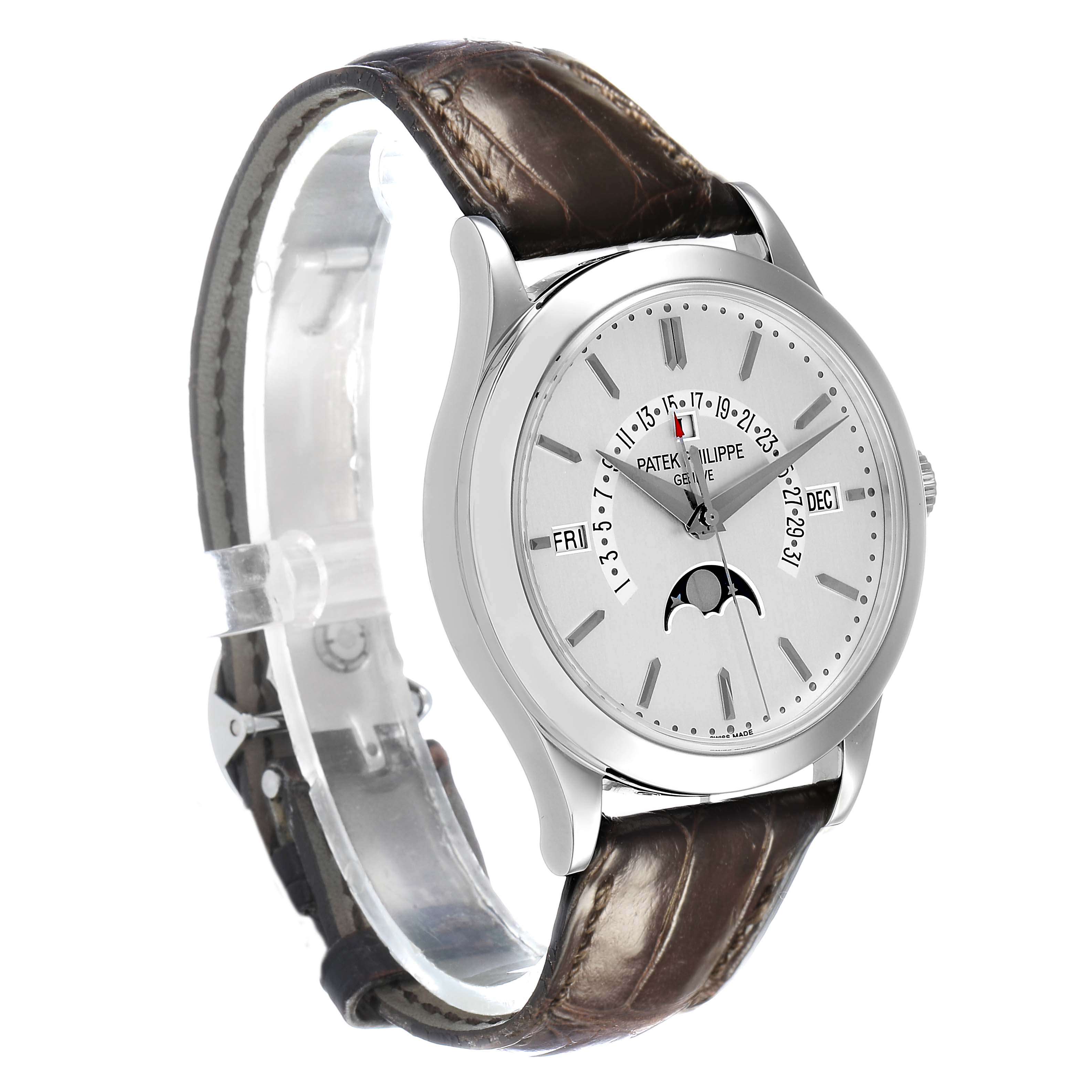 The Patek Philippe Complications 5496P Men's Platinum Silver Dial model is shown at a three-quarter angle, highlighting the face, dial, and brown leather strap.