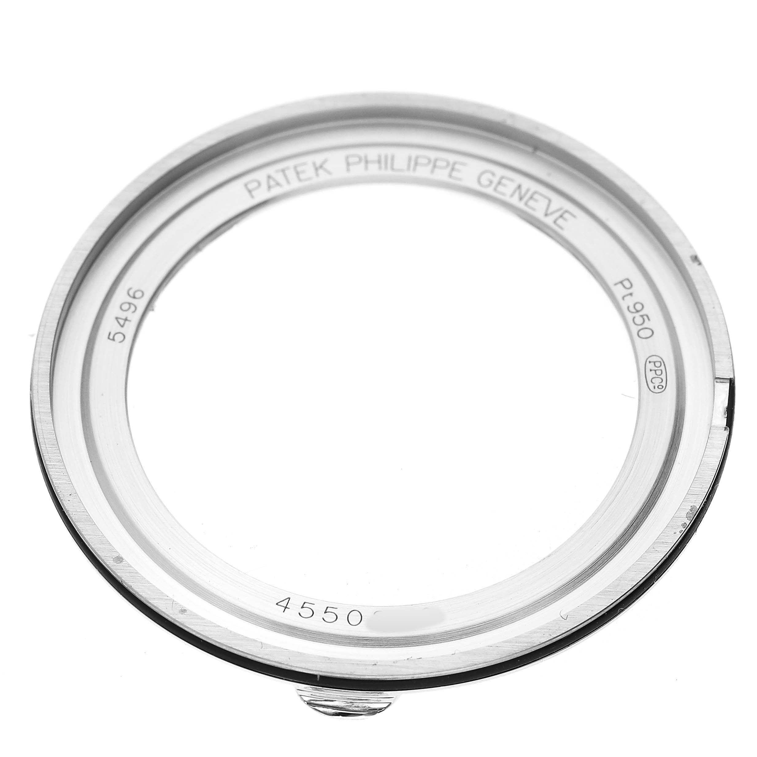 The image shows the bezel from a Patek Philippe Complications 5496P Men's Platinum Silver Dial watch at a top-down angle.