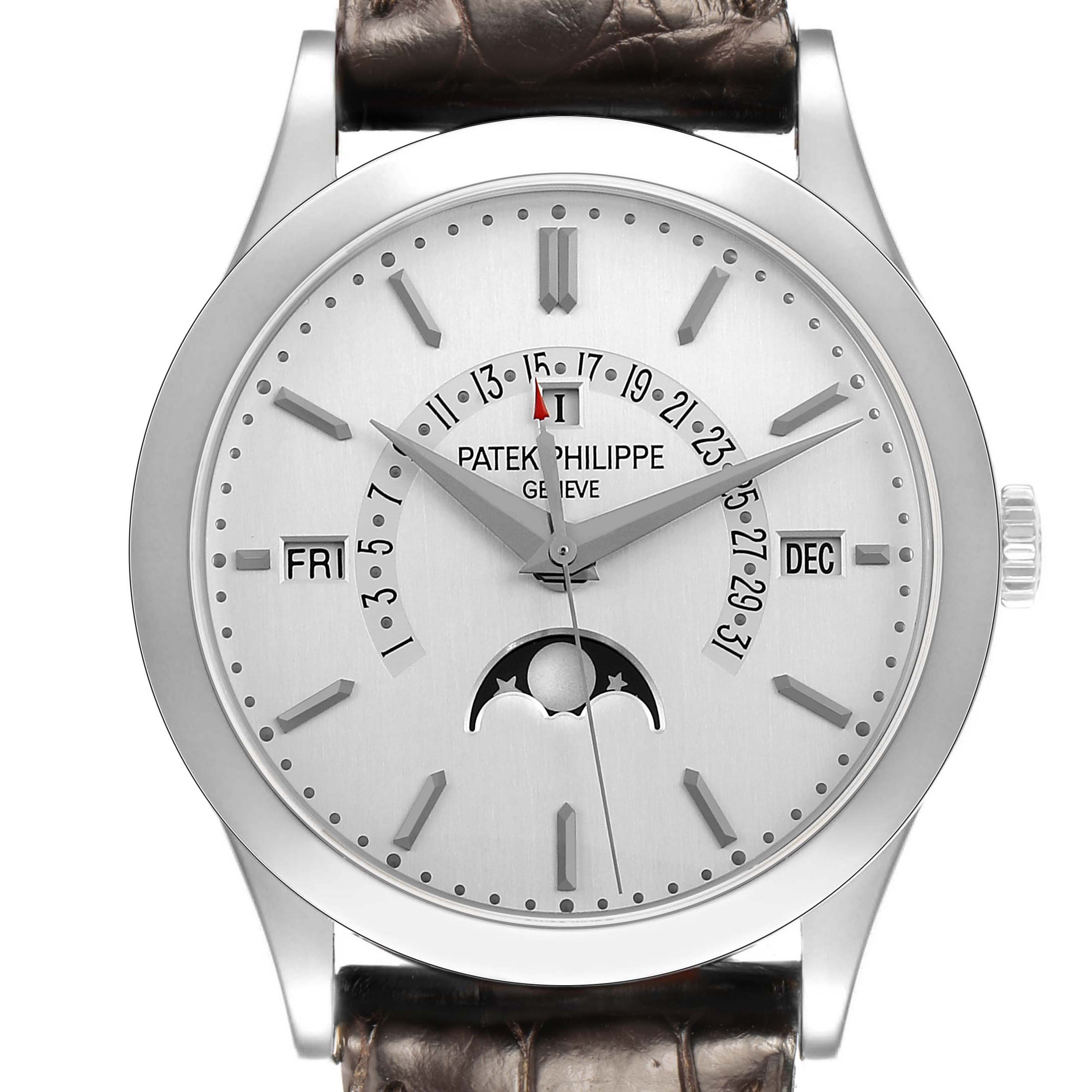 The Patek Philippe Complications 5496P Men's Platinum Silver Dial watch is shown from a front angle, displaying the face, dial, moon phase, and leather strap.