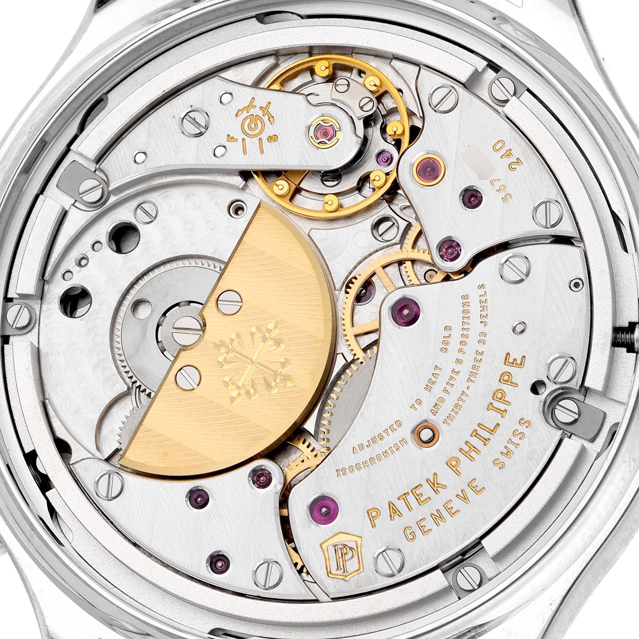 The image shows the intricate movement and components of a Patek Philippe Complications 7130G Men's White Gold Brown Dial watch from a back view.