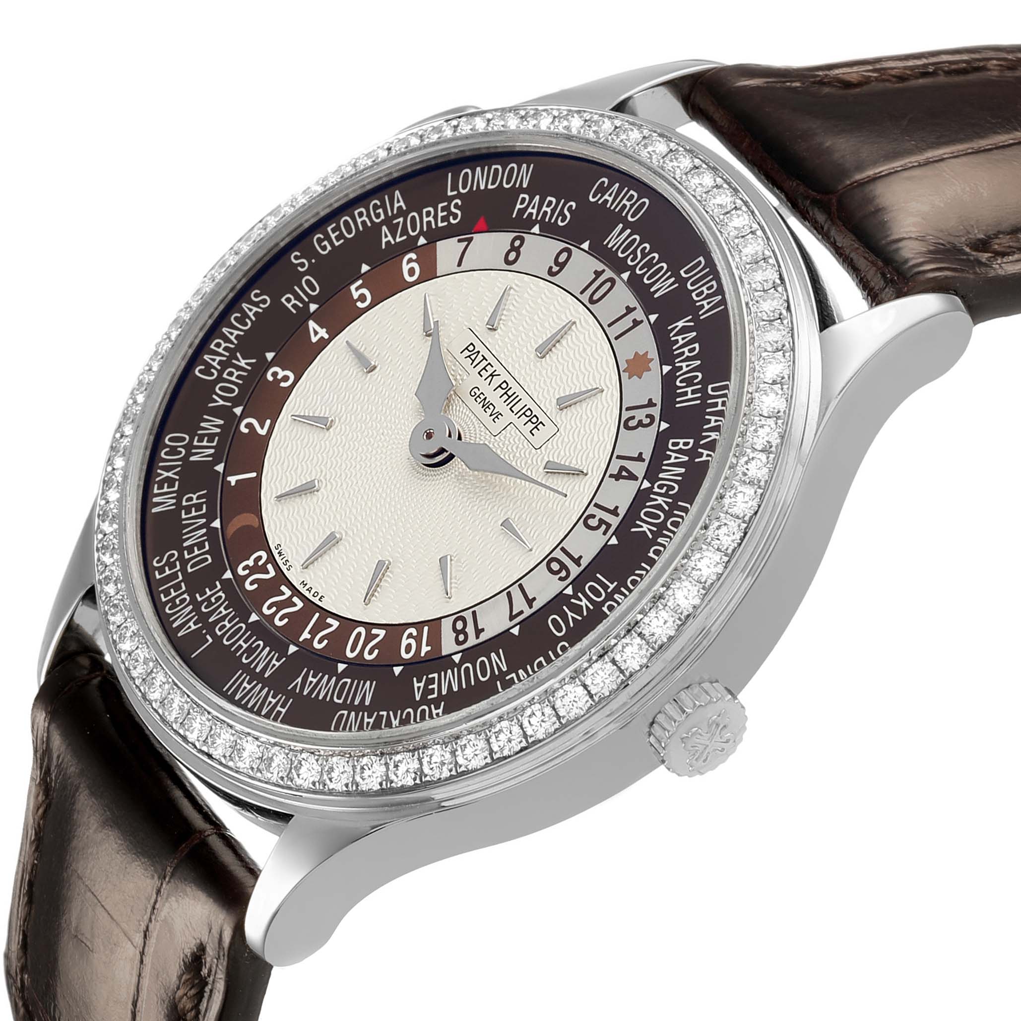 The image shows a side angle of the Patek Philippe Complications 7130G Men's White Gold Brown Dial watch, highlighting the bezel, dial, and crown.