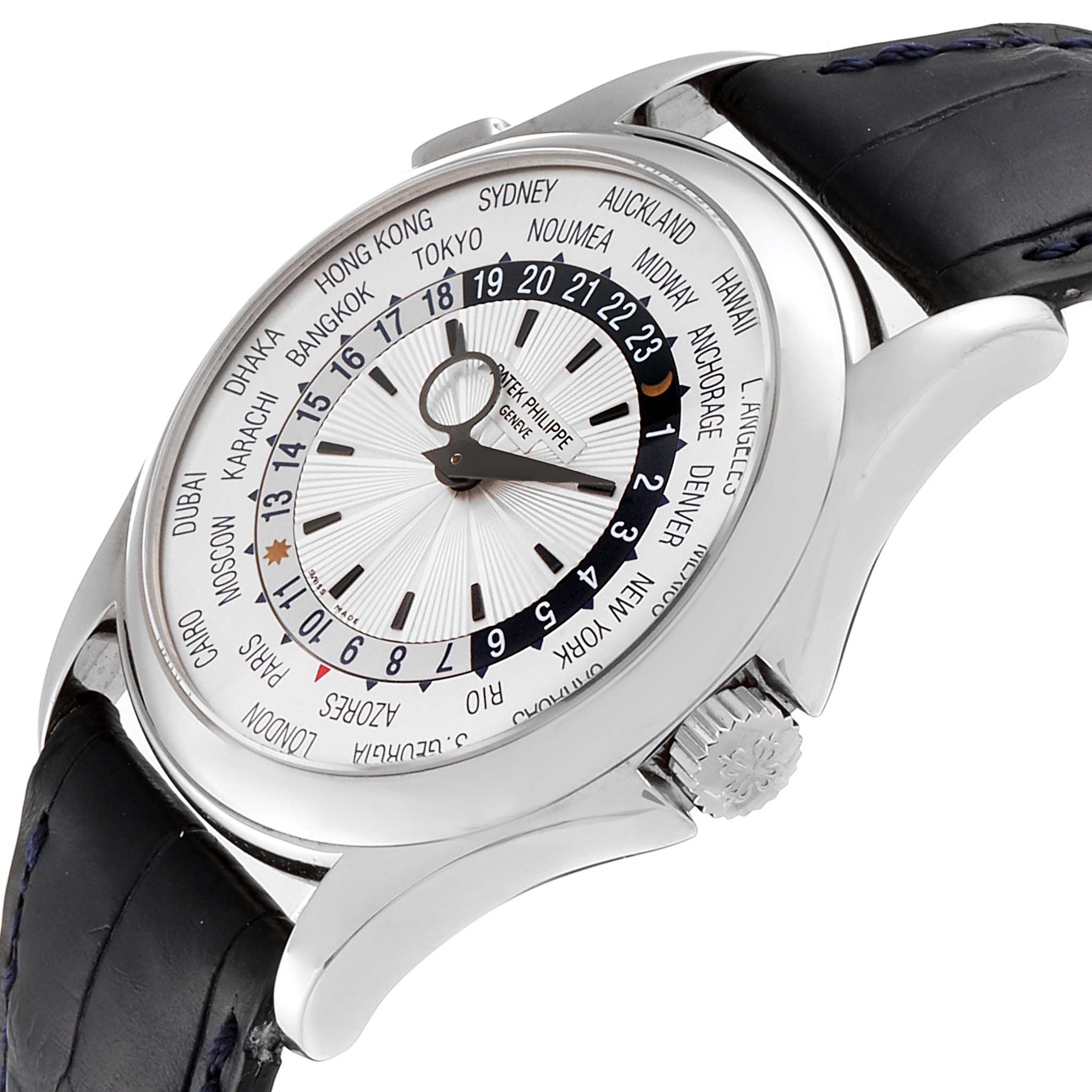 The image shows a side and partial front view of the Patek Philippe Complications 5130G Men's White Gold Silver Dial 5130G Men's White Gold Silver Dial watch, highlighting the dial and crown.