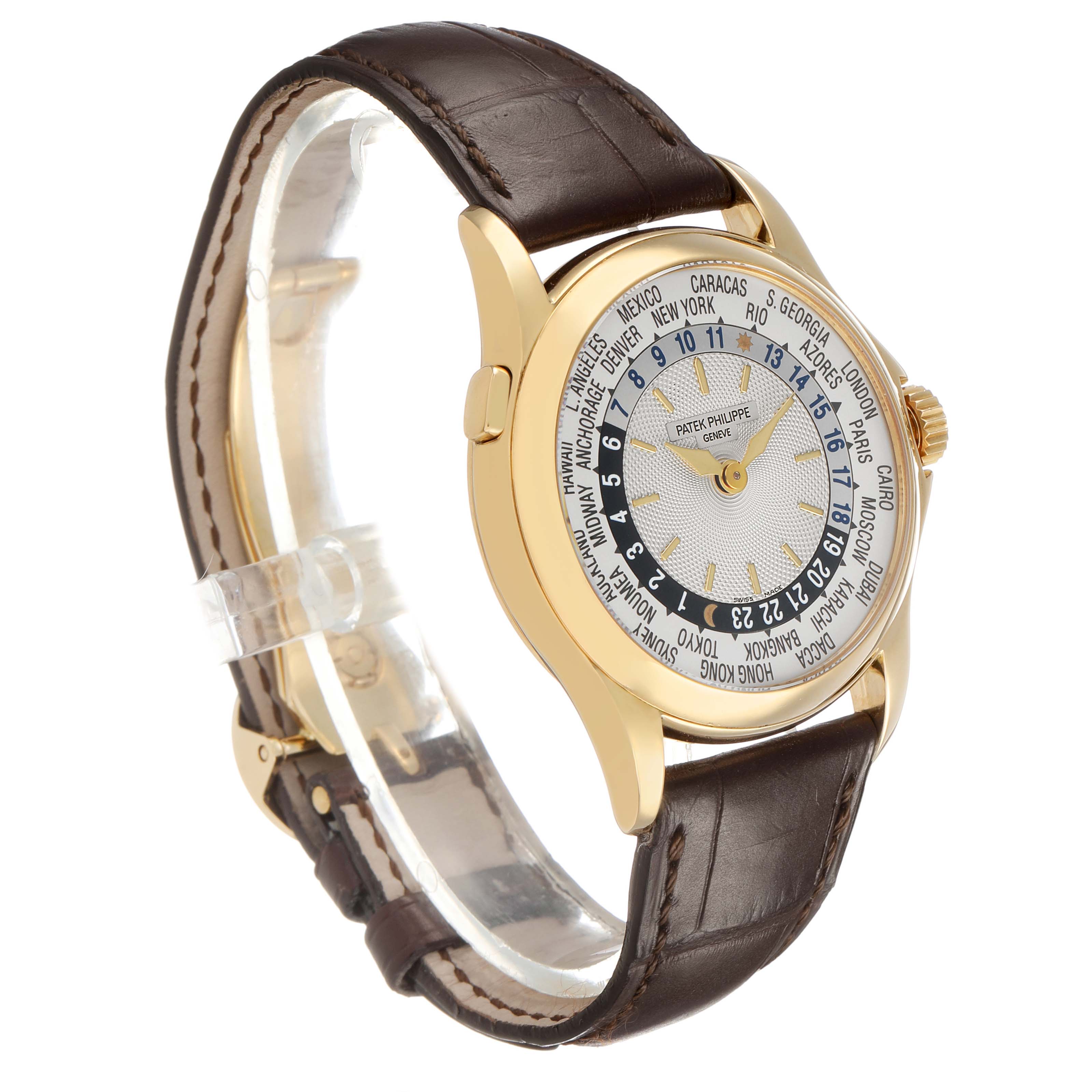 The Patek Philippe Complications 5110J Men's Yellow Gold Silver Dial watch is shown at a slight side angle, displaying the dial, case, and brown leather strap.
