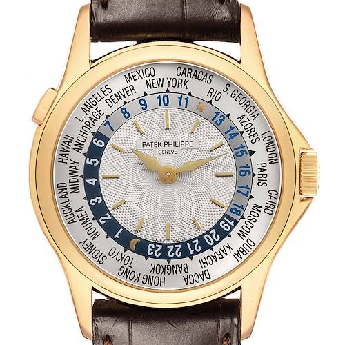 The Patek Philippe Complications 5110J Men's Yellow Gold Silver Dial watch is shown from a front angle, displaying its intricate dial with world time zones.