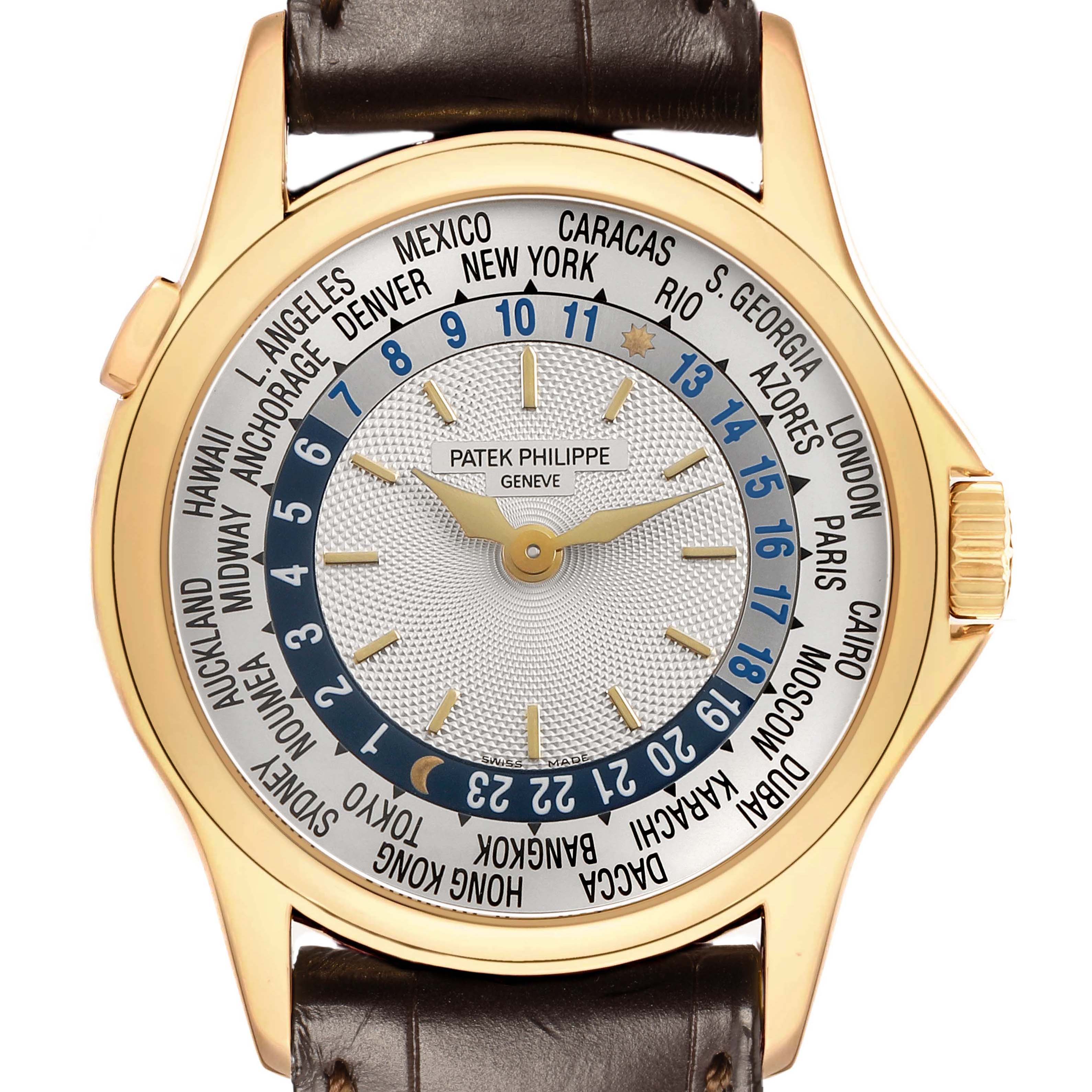 This image shows a front view of the Patek Philippe Complications 5110J Men's Yellow Gold Silver Dial watch, highlighting its dial with world time zones and complications.