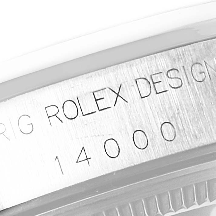 This is a close-up shot of the engraved case side of the Rolex Air-King 14000 Men's Stainless Steel White Dial 14000 Men's Stainless Steel White Dial watch showing the model number 14000.