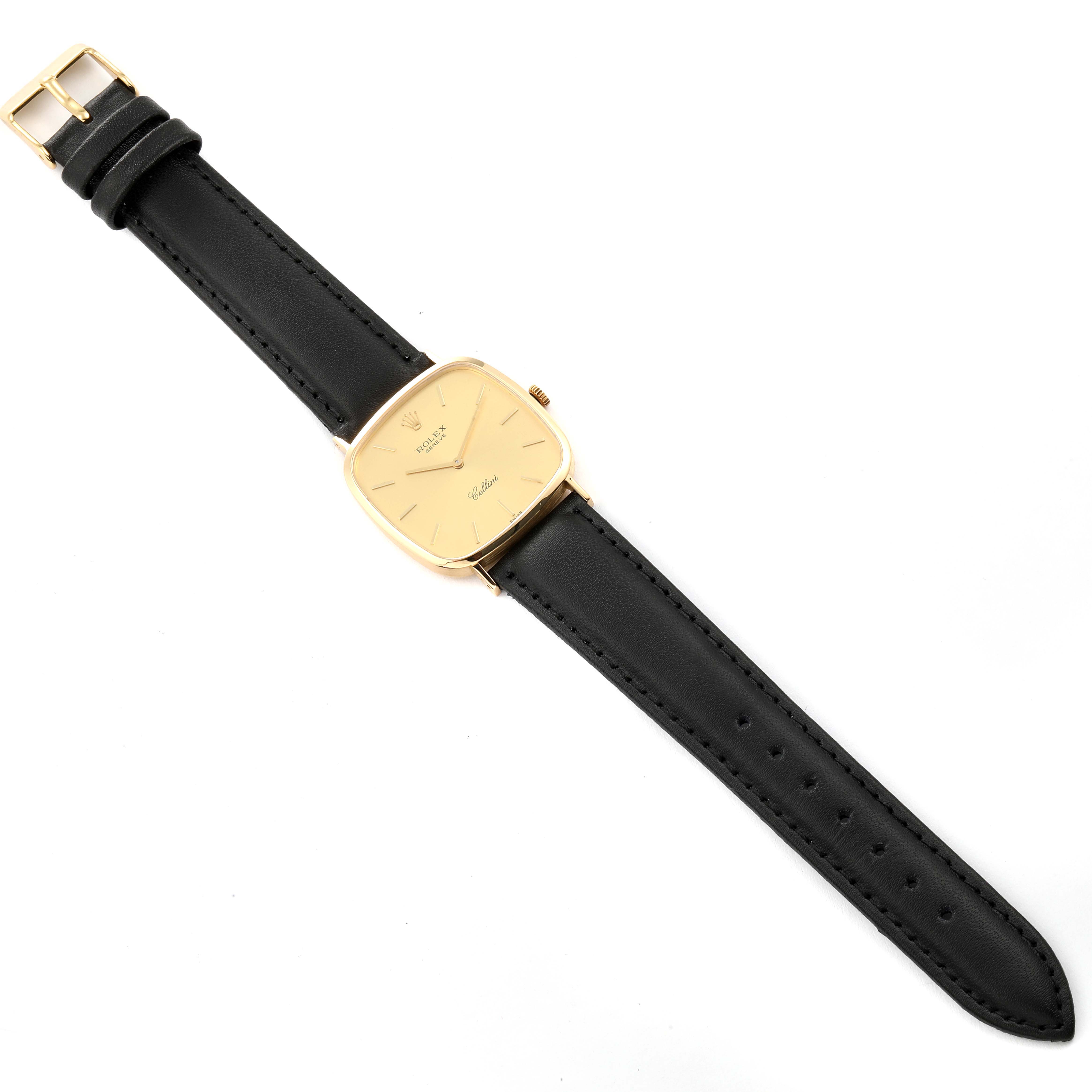 This image shows a full view of a Rolex Vintage Collection 4114 Men's Yellow Gold Champagne Dial 4114 Men's Yellow Gold Champagne Dial watch with a black leather strap and a gold square dial.