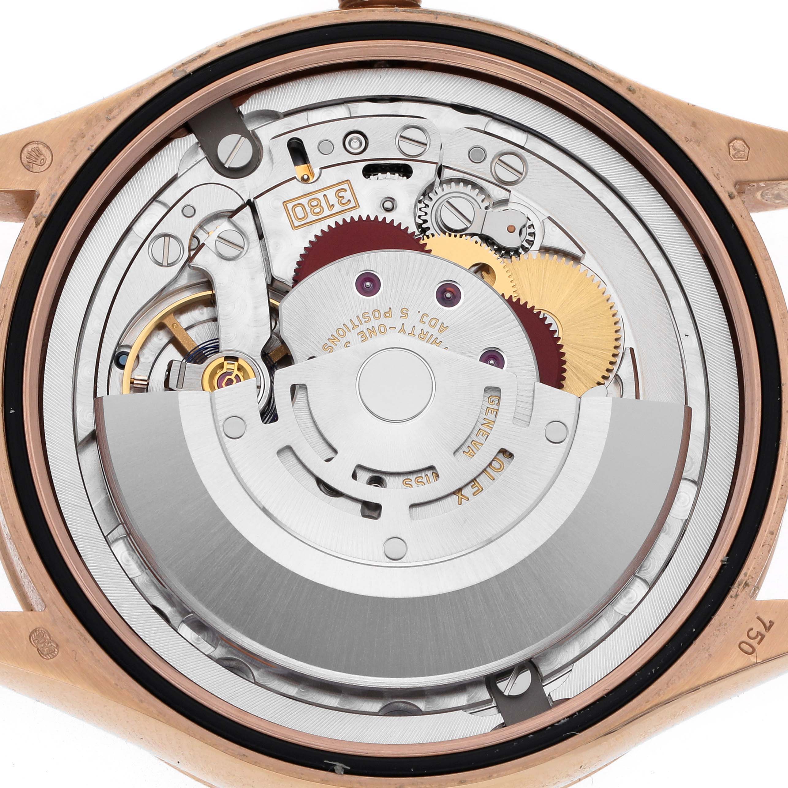 The image shows the Rolex Cellini 50525 Men
s Rose Gold Black Dial 50525 Men
s Rose Gold Black Dial watch movement from the back, revealing gears, rotors, and intricate components.