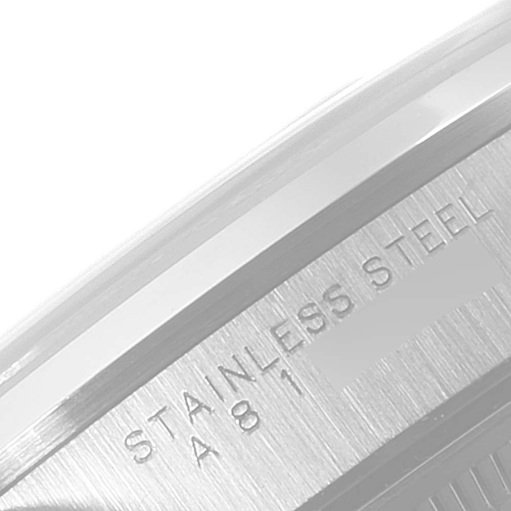 This image shows a close-up view of the caseback engraving on a Rolex Date 15200 Men's Stainless Steel Silver Dial 15200 Men's Stainless Steel Silver Dial model watch, highlighting the text "STAINLESS STEEL".