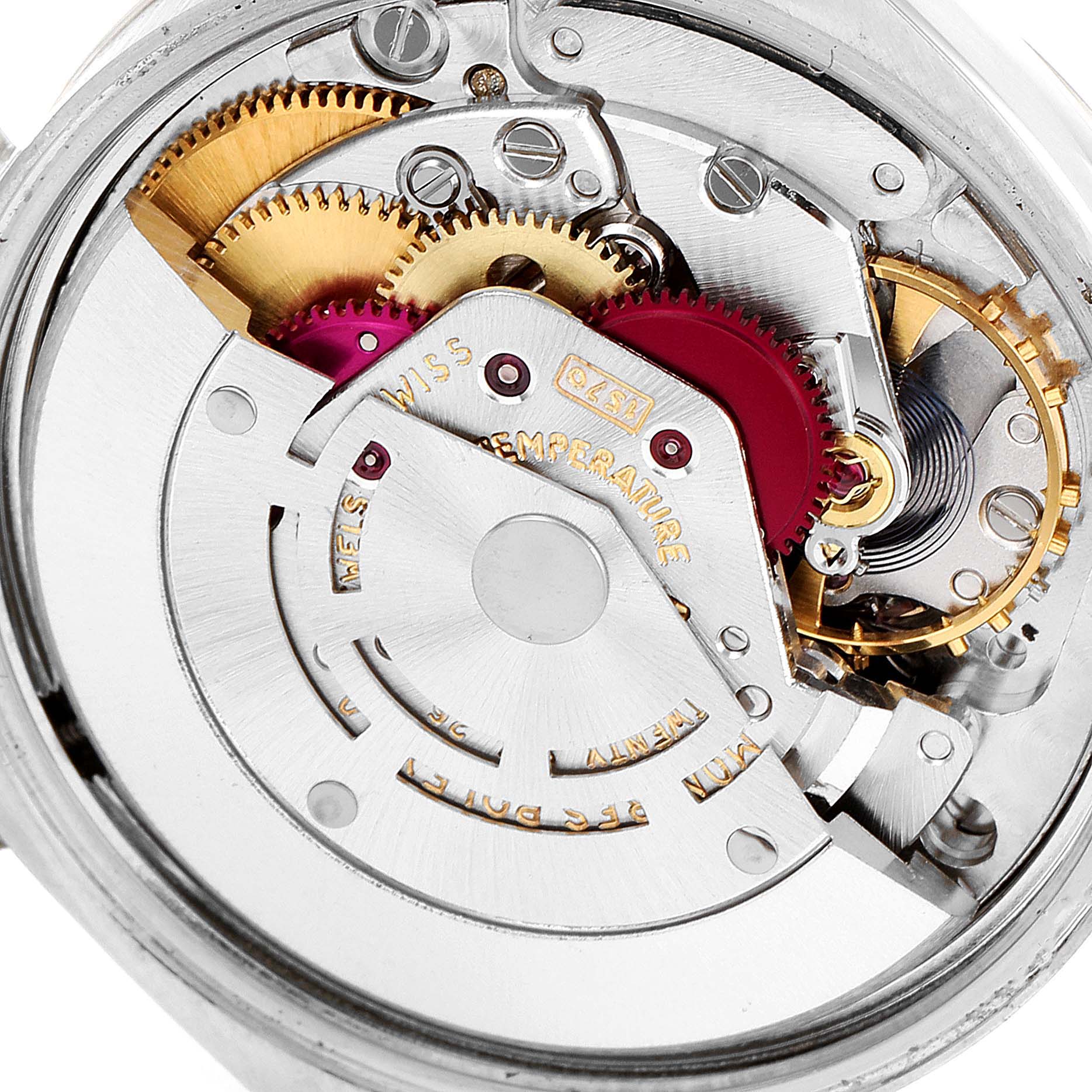 The image shows a close-up of the movement mechanism inside a Rolex Date 1500 Men's Stainless Steel Silver Dial 1500 Men's Stainless Steel Silver Dial model watch, highlighting gears and components.