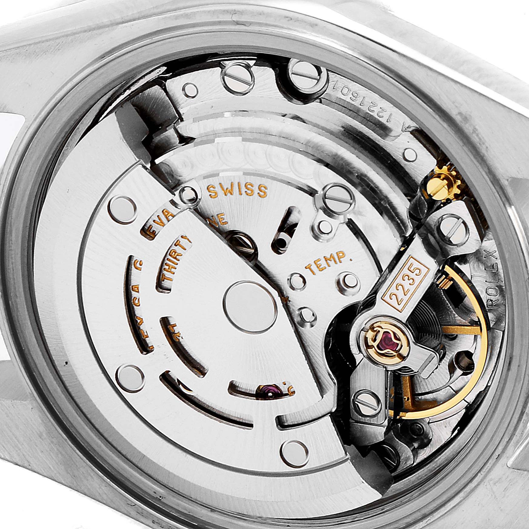 The image shows a close-up view of the Rolex Datejust 79173 Women's Steel and Gold (two tone) Mother of Pearl Dial 79173 Women's Steel and Gold (two tone) Mother of Pearl Dial watch movement and its inner mechanical components.