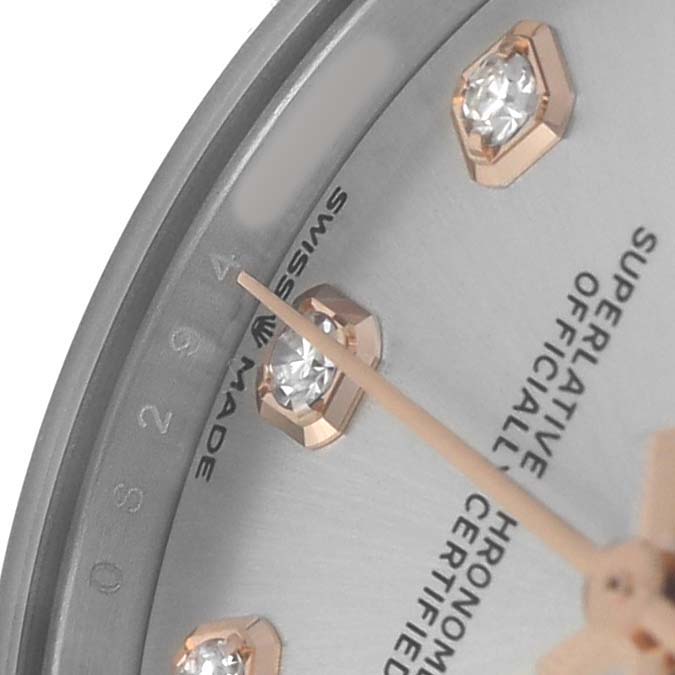 The image shows a close-up of the Rolex Mid-Size 278271 Women's Steel and Gold (two tone) Silver Dial watch's face, highlighting diamond hour markers and part of the dial text.