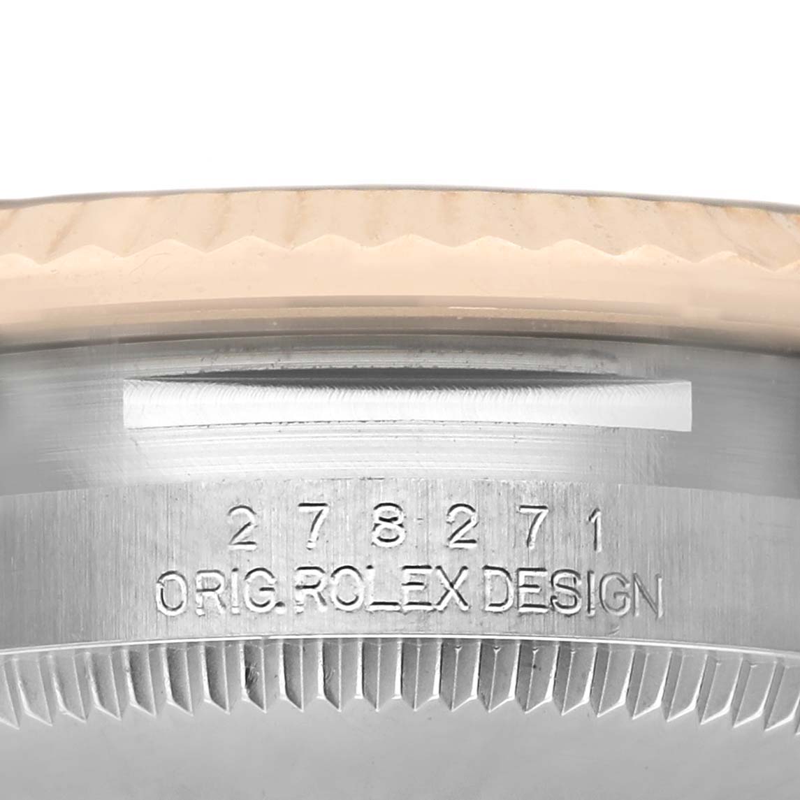 The image shows a close-up of the Rolex Mid-Size 278271 Women's Steel and Gold (two tone) Silver Dial model's case side engraving, displaying the reference number.