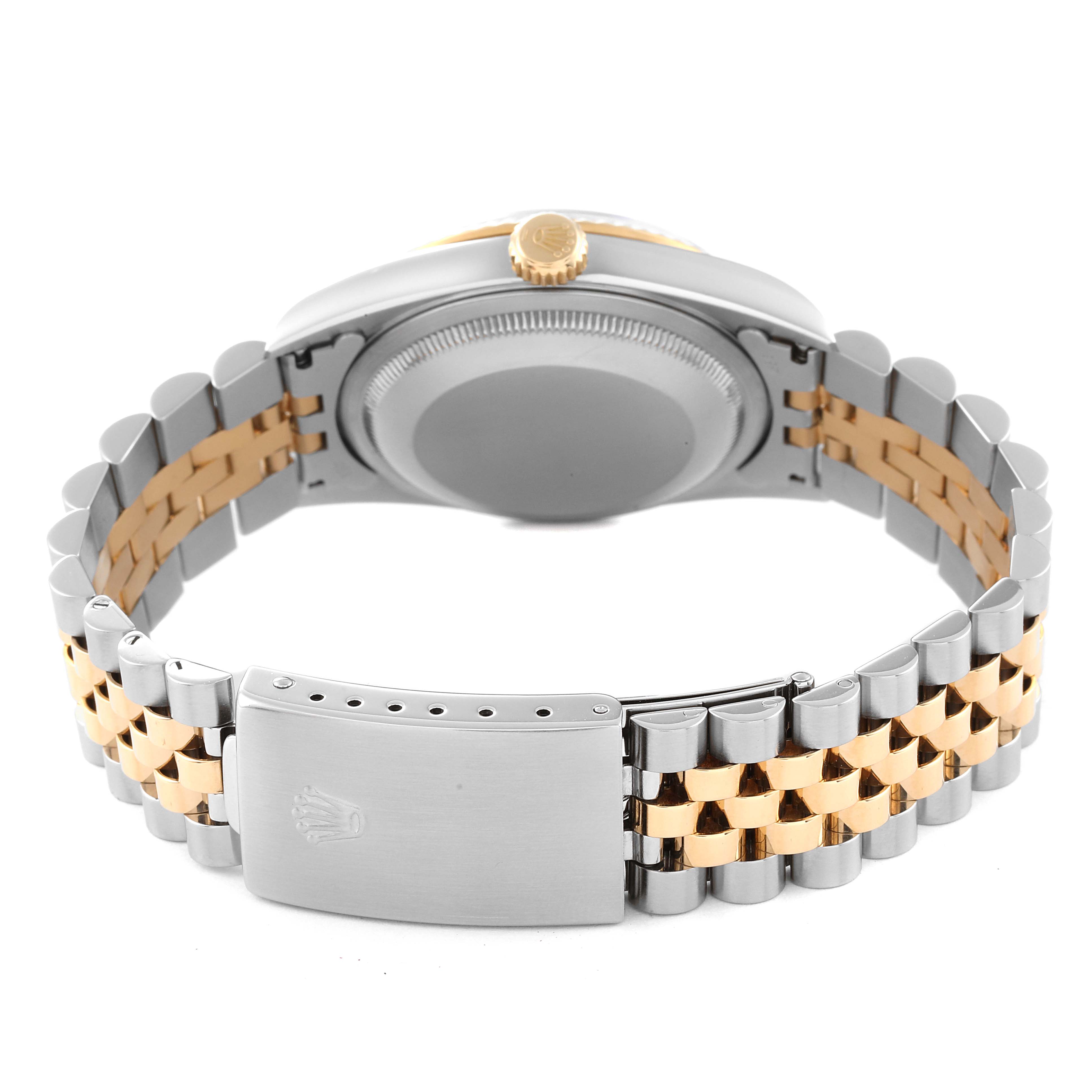 This image shows the back view of a Rolex Datejust 16233 Men's Steel and Gold (two tone) Blue Dial 16233 Men's Steel and Gold (two tone) Blue Dial watch, highlighting its two-tone metal bracelet and clasp.