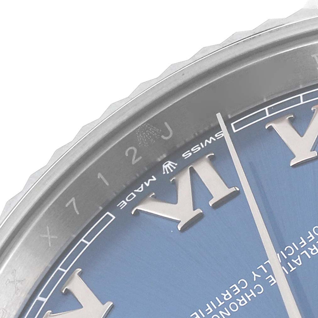 This image shows a close-up of the dial edge and bezel of a Rolex Datejust 41 126334 Men's Stainless Steel Blue Dial 126334 Men's Stainless Steel Blue Dial watch, including part of the Roman numeral markers and the "Swiss Made" text.