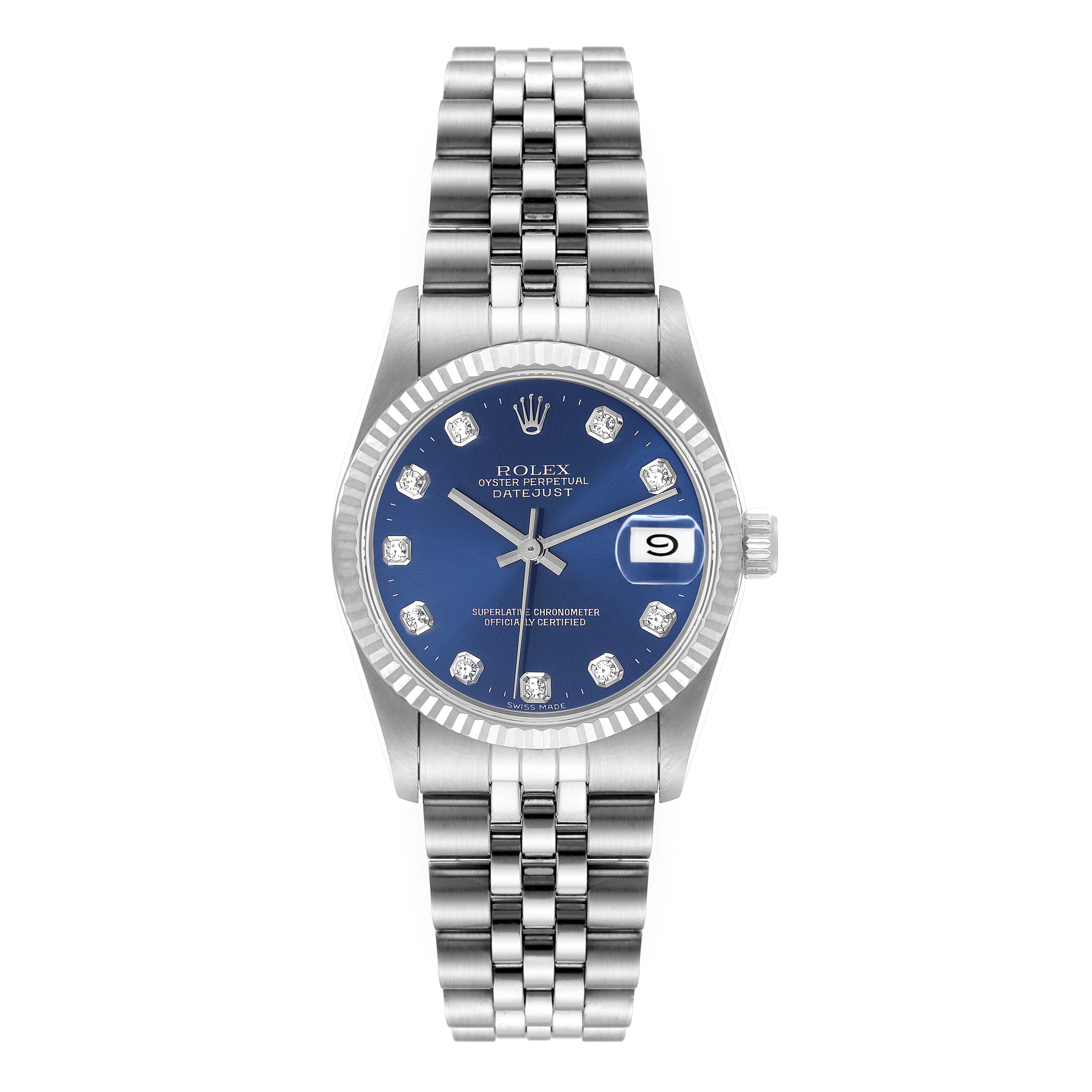 This Mid-Size Rolex watch is shown from a top-down angle displaying the face, bezel, crown, and Jubilee bracelet.