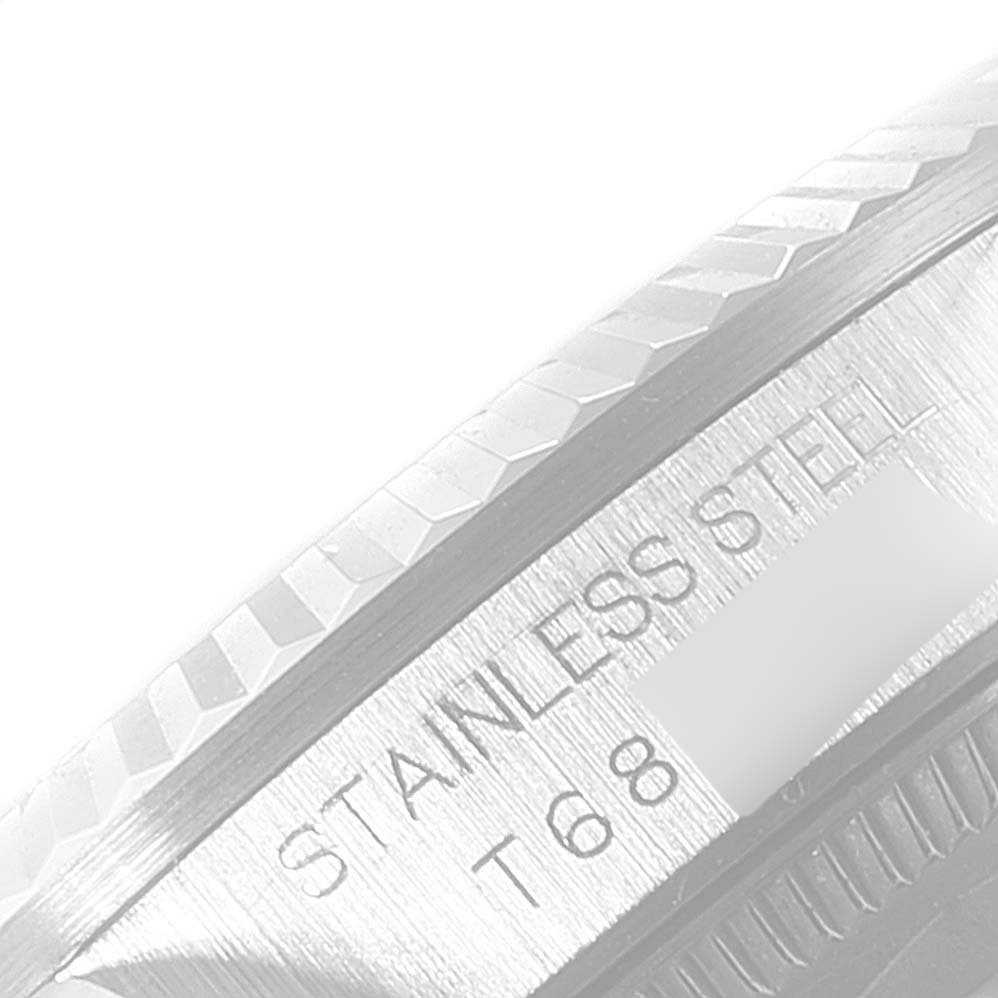 The image shows a close-up angle of the stainless steel caseback of a Rolex Mid-Size 68274 Women's Stainless Steel Blue Dial 68274 Women's Stainless Steel Blue Dial model watch with engraved text.