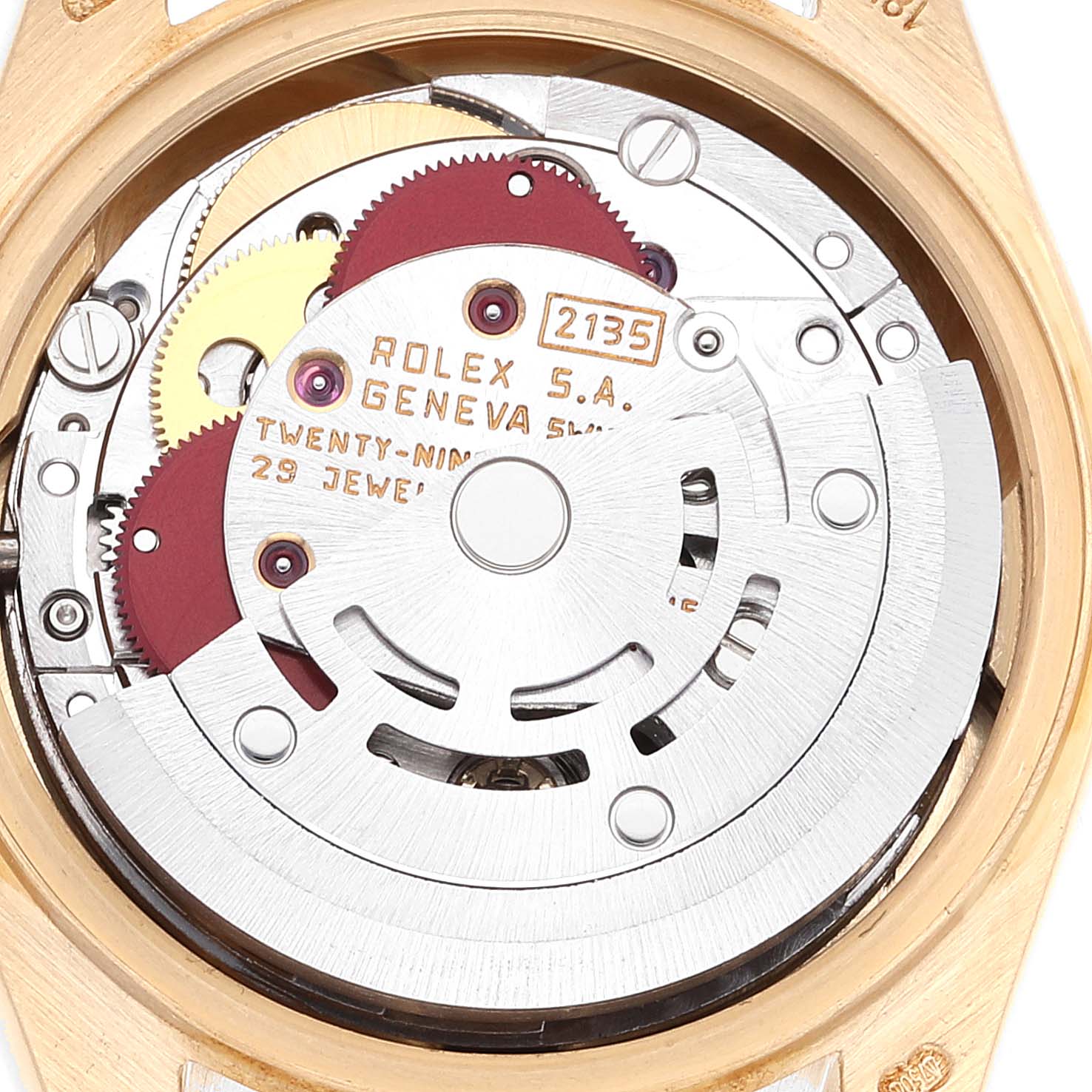 This image shows a close-up view of the Rolex President 69178 Women
s Yellow Gold Champagne Dial 69178 Women
s Yellow Gold Champagne Dial watch movement, highlighting internal gears and components of the 29-jewel 2135 model.