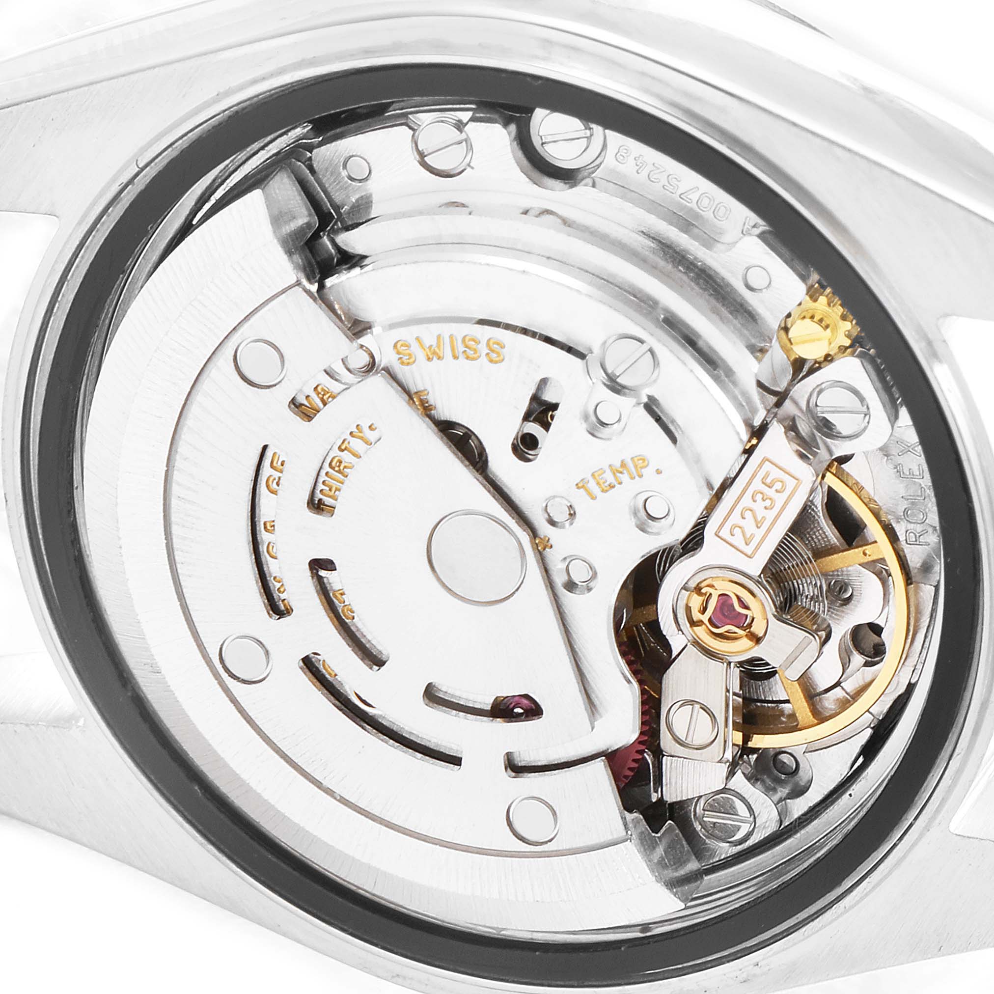 The image shows the movement mechanism of a Rolex Datejust 79174 Women's Stainless Steel Black Dial 79174 Women's Stainless Steel Black Dial watch from a macro angle.