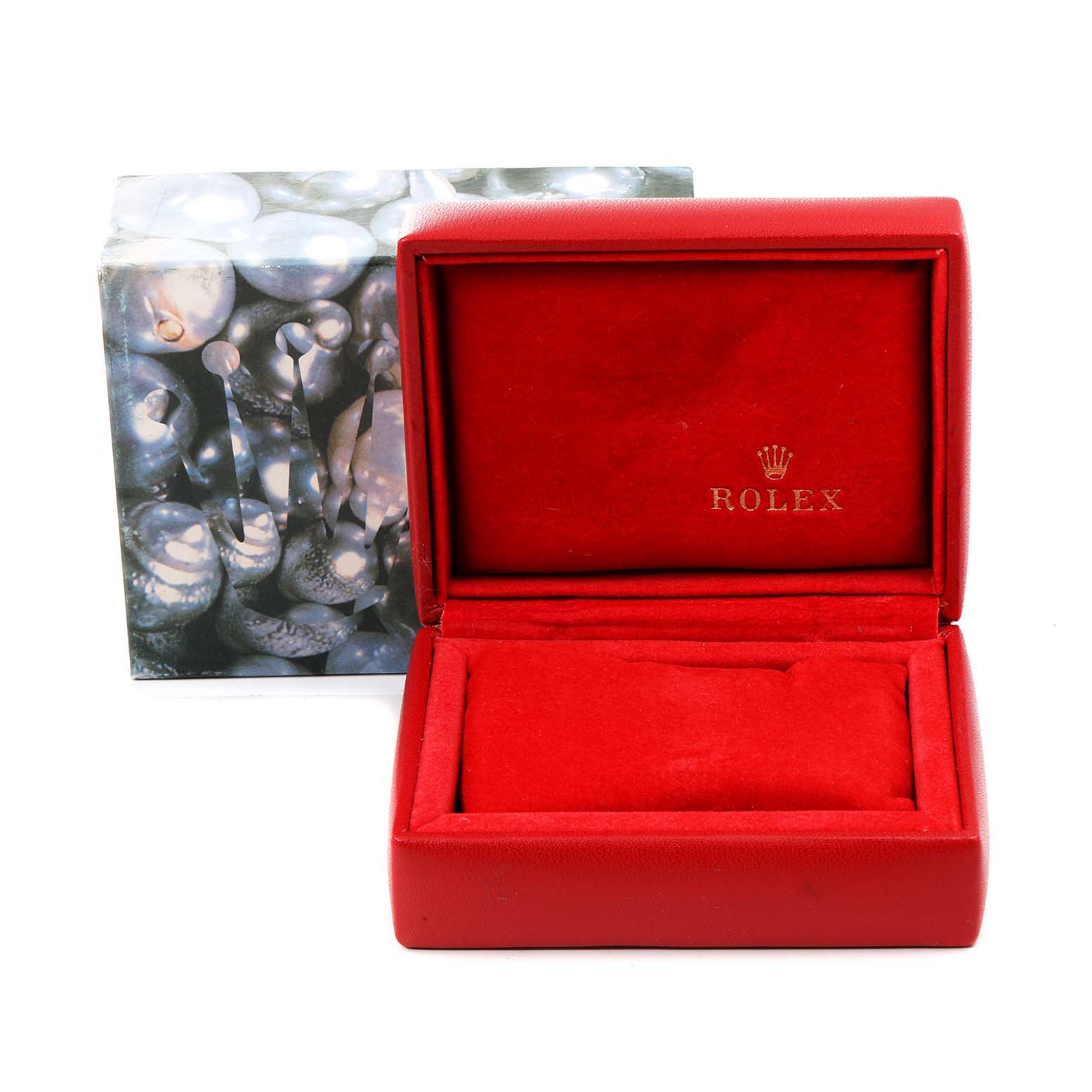 This image shows a red Rolex Datejust 79174 Women's Stainless Steel Black Dial 79174 Women's Stainless Steel Black Dial watch box with the lid open, revealing the interior lined in red fabric.