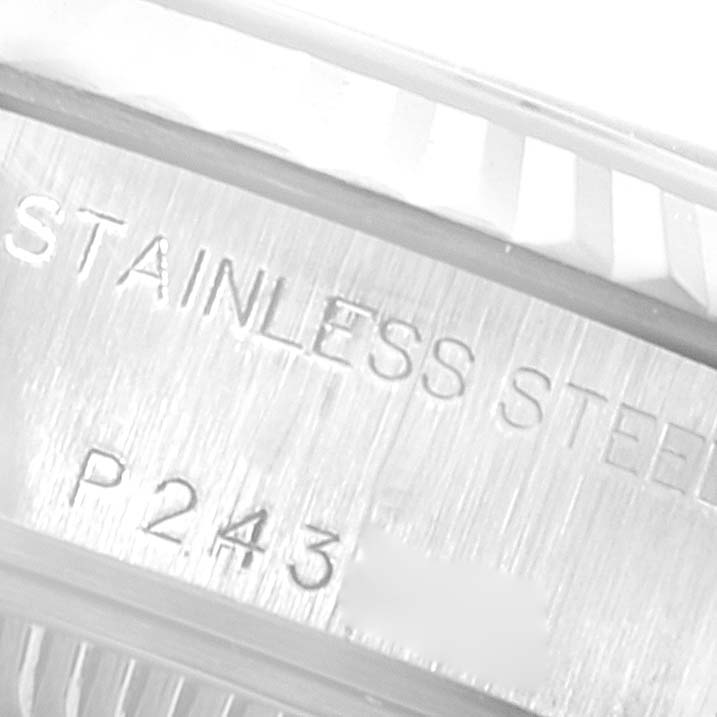 This is a close-up shot of the Rolex Datejust 79174 Women's Stainless Steel Mother of Pearl Dial 79174 Women's Stainless Steel Mother of Pearl Dial bezel and inner engraving, showcasing the "Stainless Steel" text.