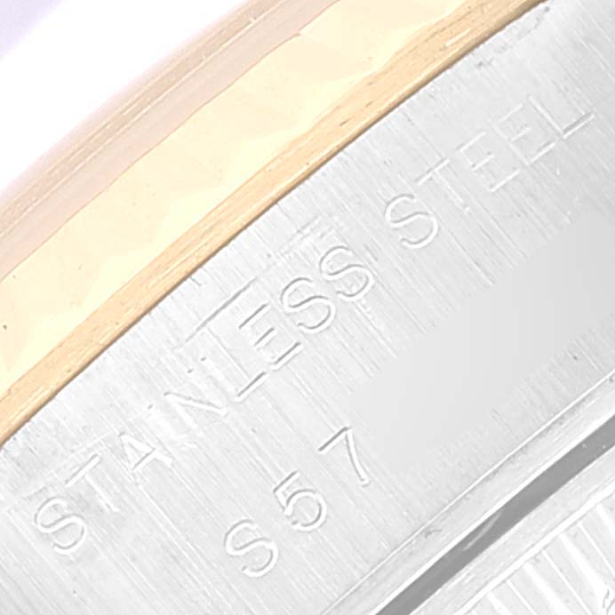 The image shows a close-up of the stainless steel case back engraving of a Rolex Datejust 69173 Women's Steel and Gold (two tone) Blue Dial 69173 Women's Steel and Gold (two tone) Blue Dial watch.