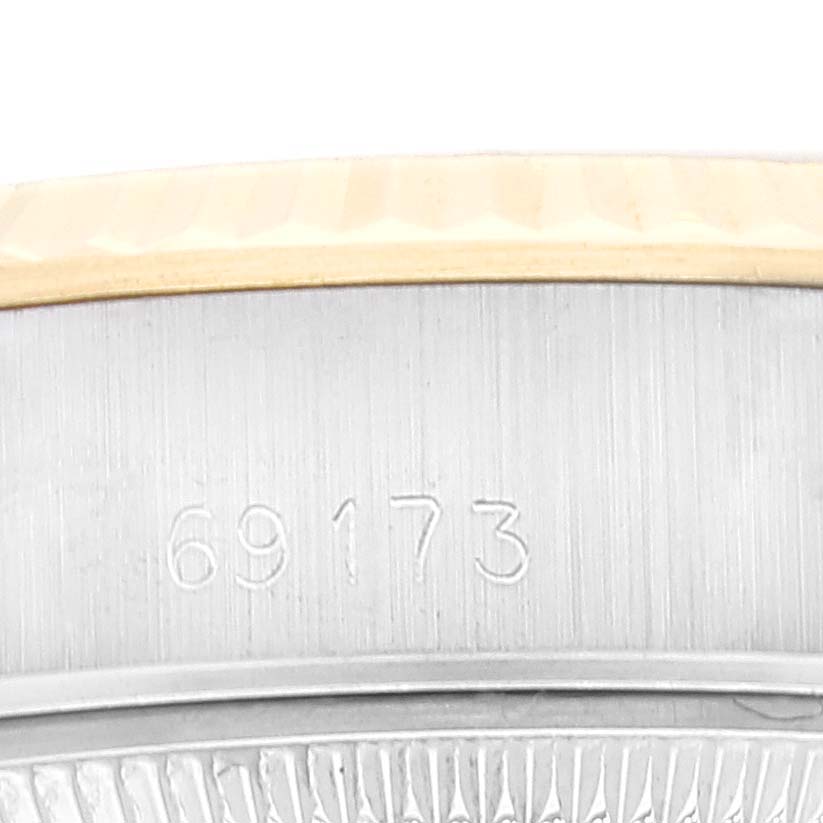 This image shows a close-up of the case side, bezel, and reference number of a Rolex Datejust 69173 Women's Steel and Gold (two tone) Champagne Dial 69173 Women's Steel and Gold (two tone) Champagne Dial model.