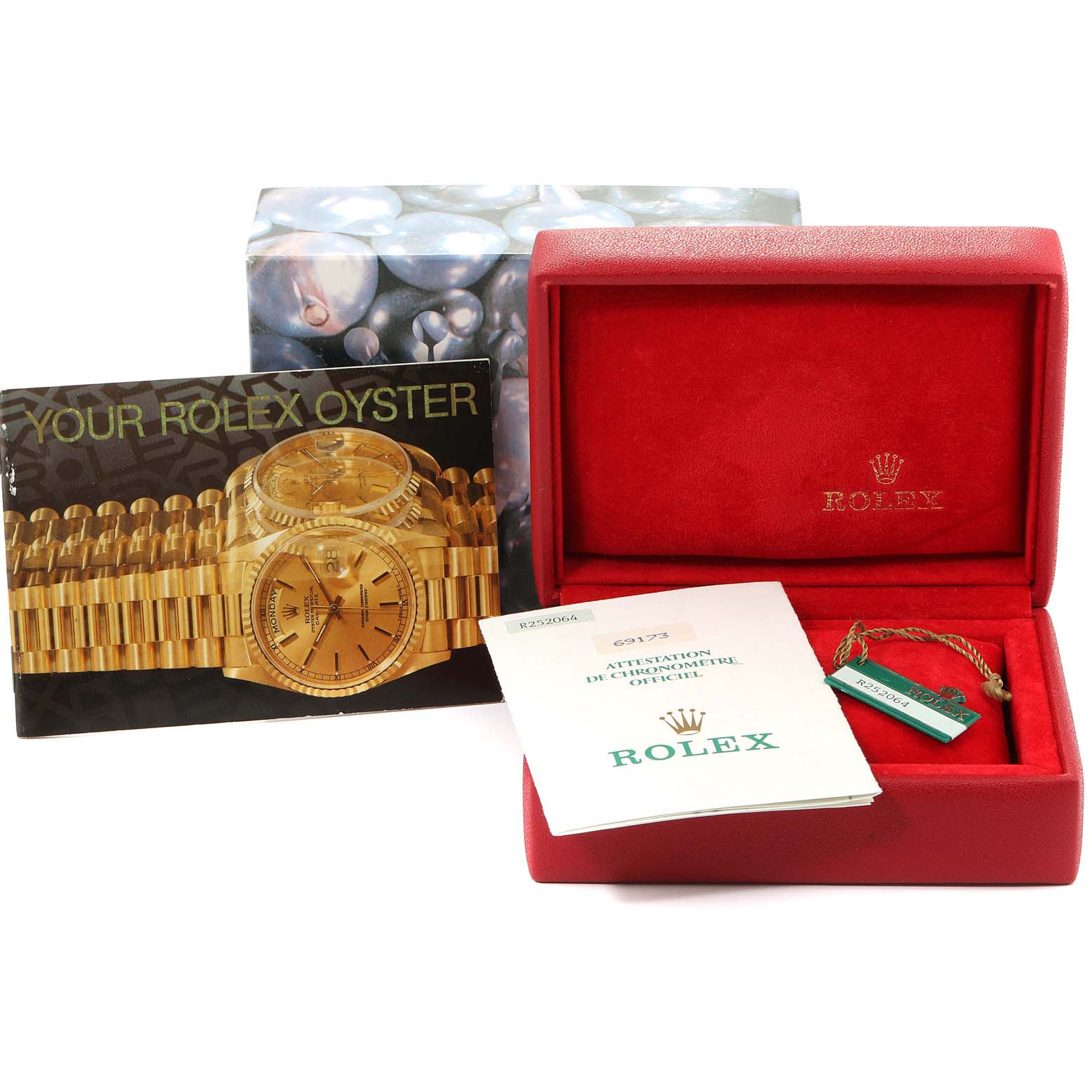 The image shows packaging and accessories for the Rolex Datejust 69173 Women's Steel and Gold (two tone) Silver Dial 69173 Women's Steel and Gold (two tone) Silver Dial watch, including a box, tags, and manuals.