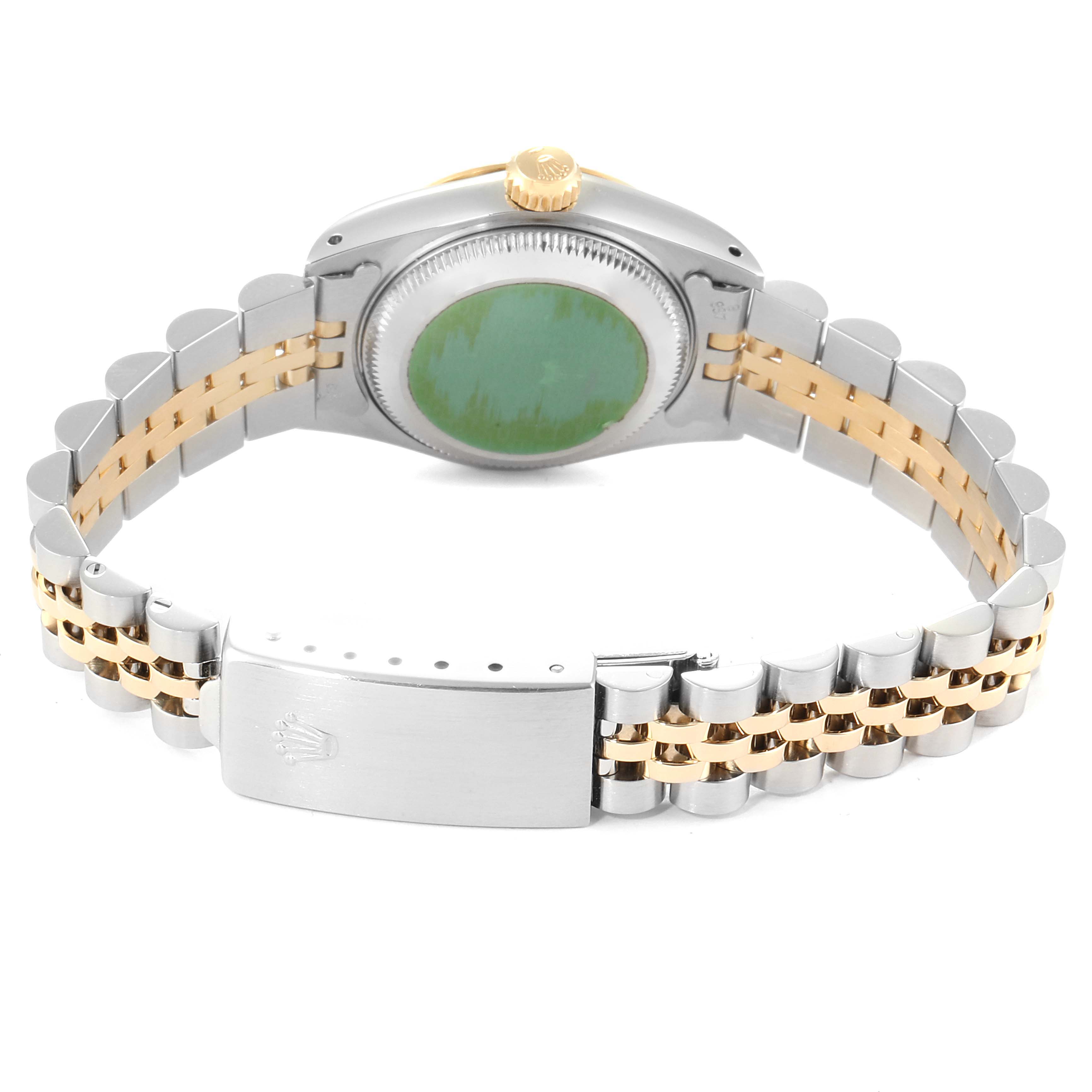 The image shows the backside of a Rolex Datejust 69173 Women's Steel and Gold (two tone) Silver Dial 69173 Women's Steel and Gold (two tone) Silver Dial watch, highlighting the case back, crown, and jubilee bracelet with clasp.