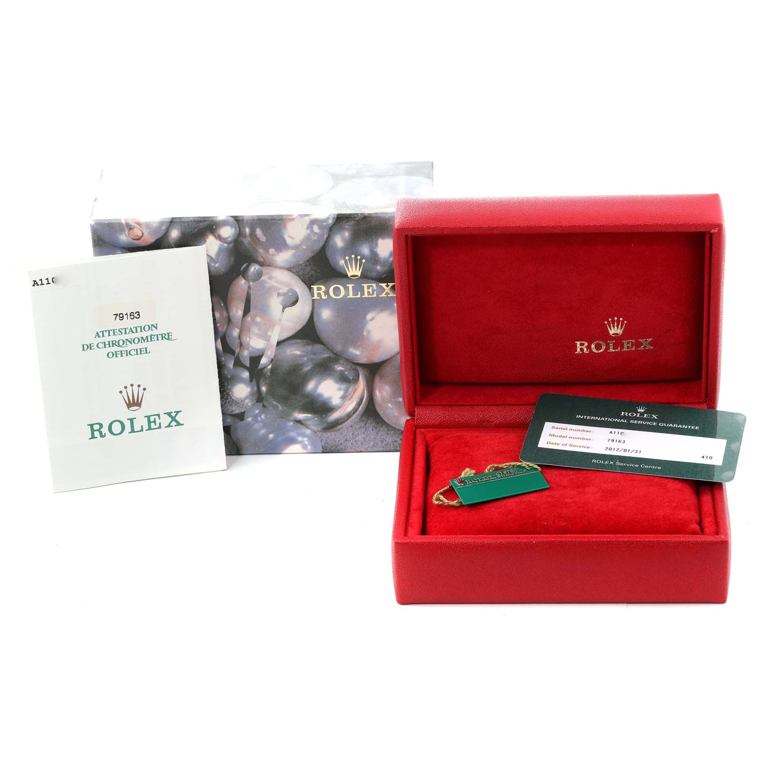 The image shows the packaging, warranty card, booklet, and red box for a Rolex Datejust 79163 Women's Steel and Gold (two tone) White Dial 79163 Women's Steel and Gold (two tone) White Dial watch.