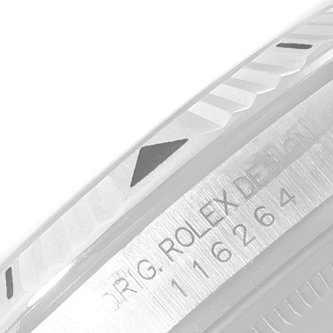 The image shows the bezel and engraved case edge of a Rolex Turn-o-Graph 116264 Men's Stainless Steel Blue Dial 116264 Men's Stainless Steel Blue Dial watch.